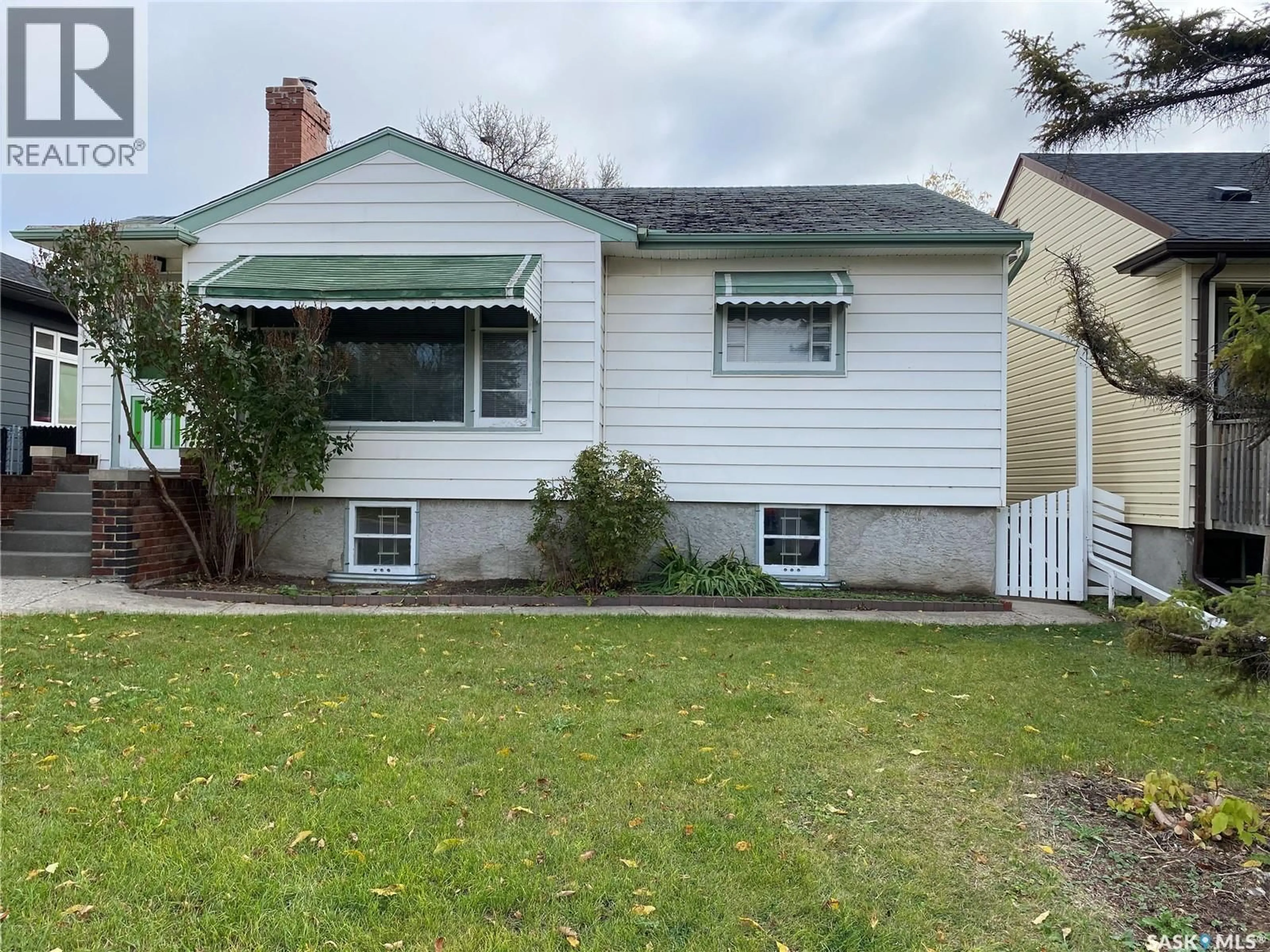 Home with vinyl exterior material, street for 2645 WINNIPEG STREET, Regina Saskatchewan S4P1H8