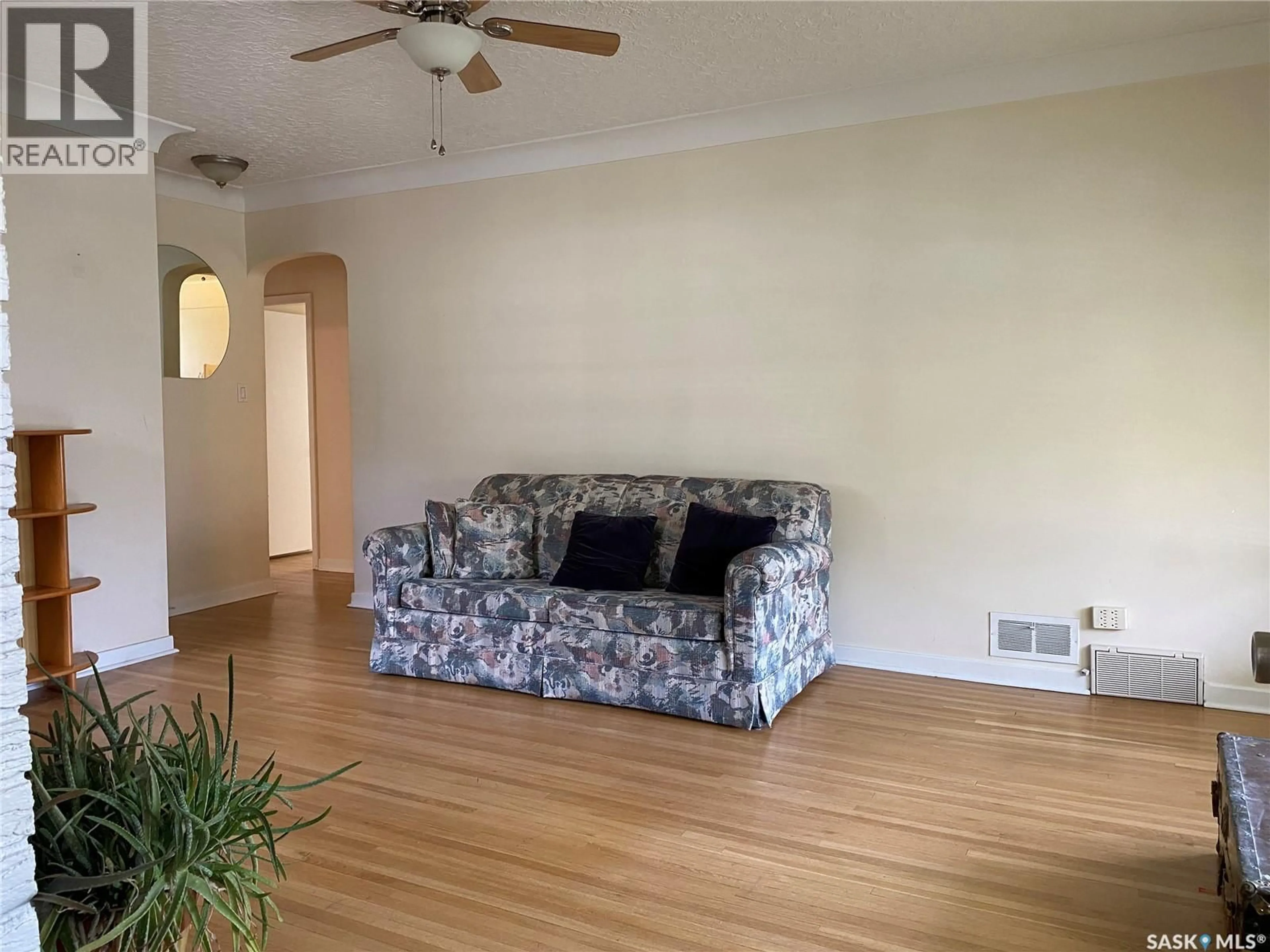 Living room with furniture, wood/laminate floor for 2645 WINNIPEG STREET, Regina Saskatchewan S4P1H8