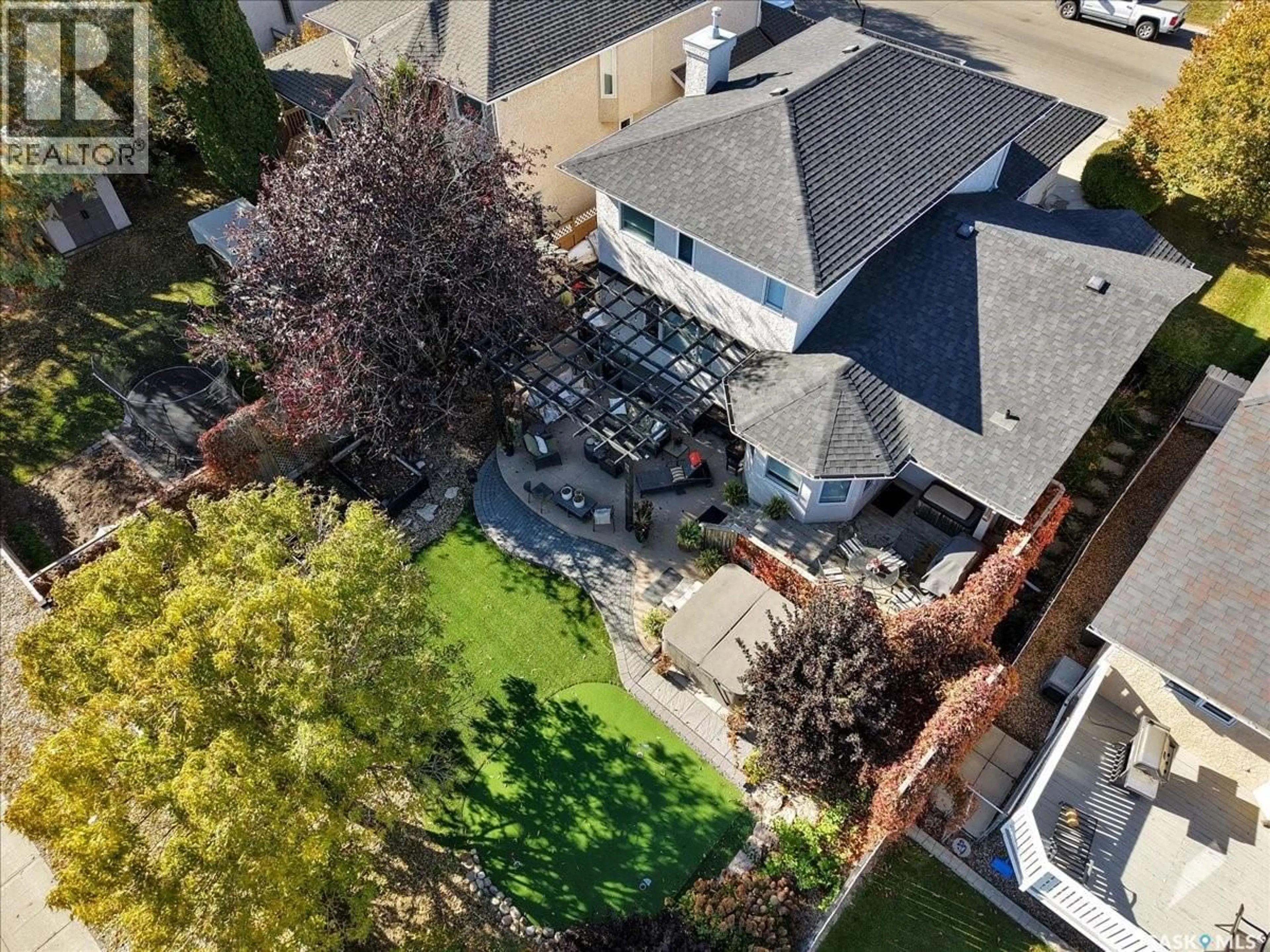 A pic from outside/outdoor area/front of a property/back of a property/a pic from drone, street for 835 SWAN CRESCENT, Saskatoon Saskatchewan S7J5C7