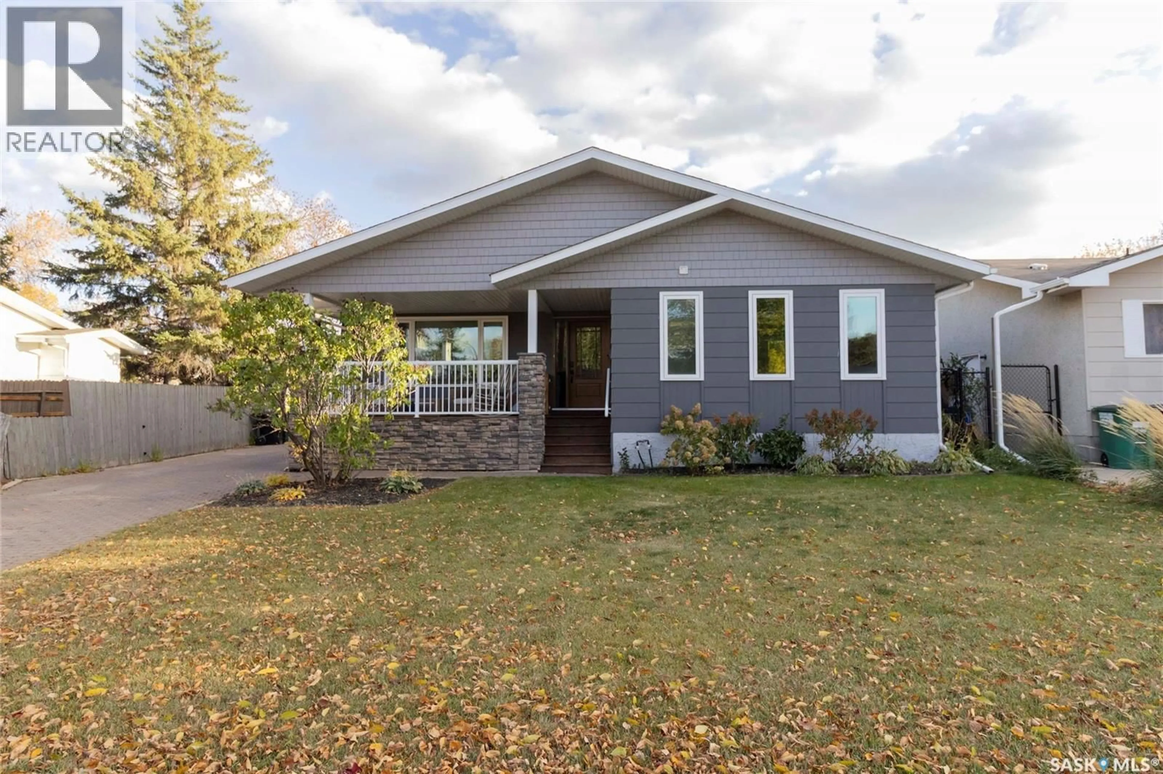 Home with vinyl exterior material, street for 543 REDBERRY ROAD, Saskatoon Saskatchewan S7K4S2