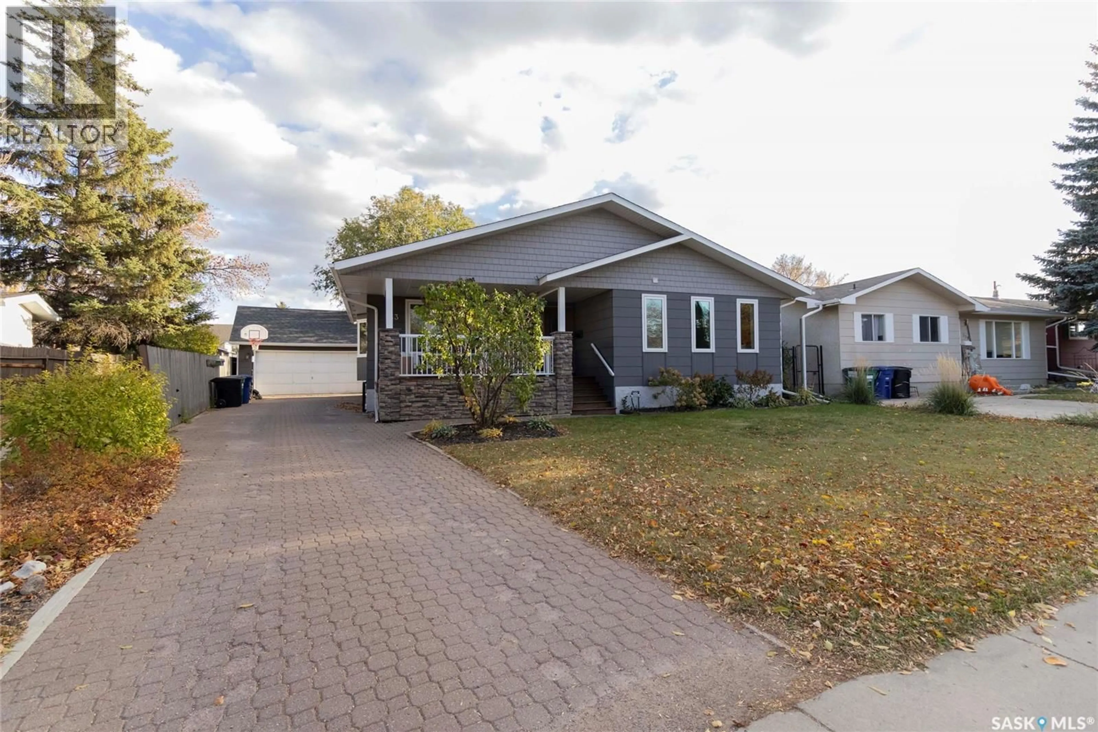 Home with vinyl exterior material, street for 543 REDBERRY ROAD, Saskatoon Saskatchewan S7K4S2