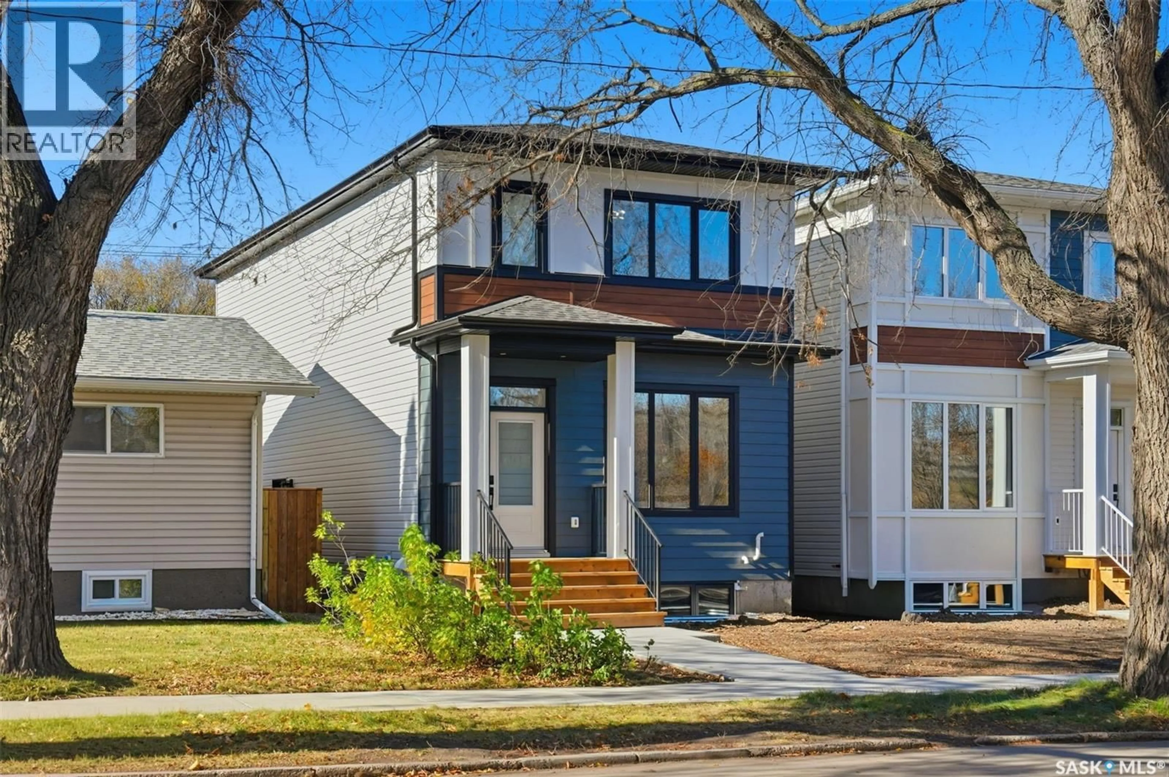 Home with brick exterior material, street for 1914 HERMAN AVENUE, Saskatoon Saskatchewan S7M0M8
