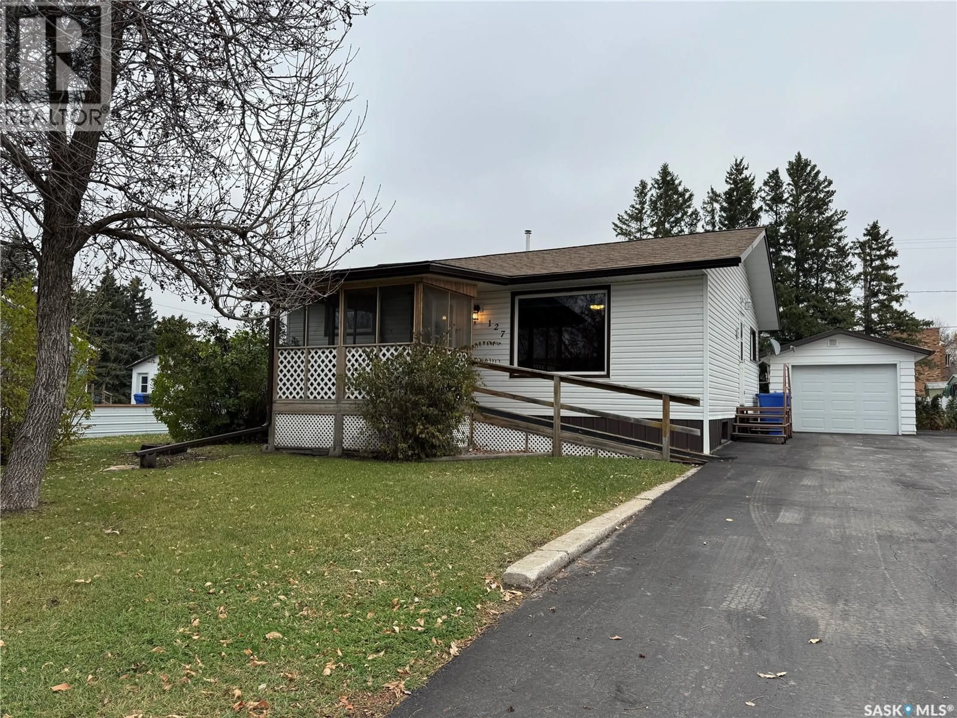 Home with vinyl exterior material, street for 127 BROADWAY STREET, Foam Lake Saskatchewan S0A1A0