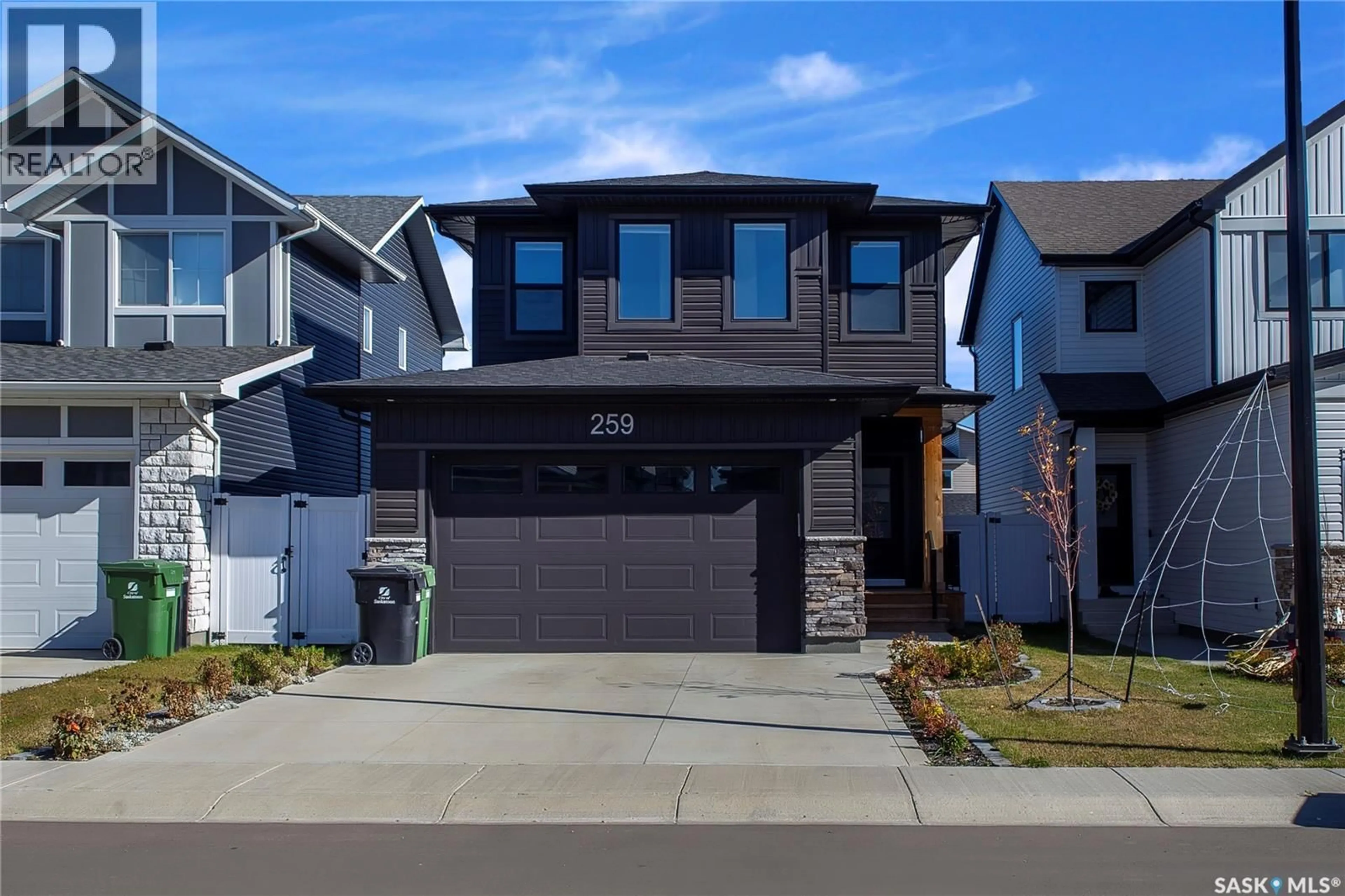 Home with brick exterior material, street for 259 PRASAD MANOR, Saskatoon Saskatchewan S7V1L4