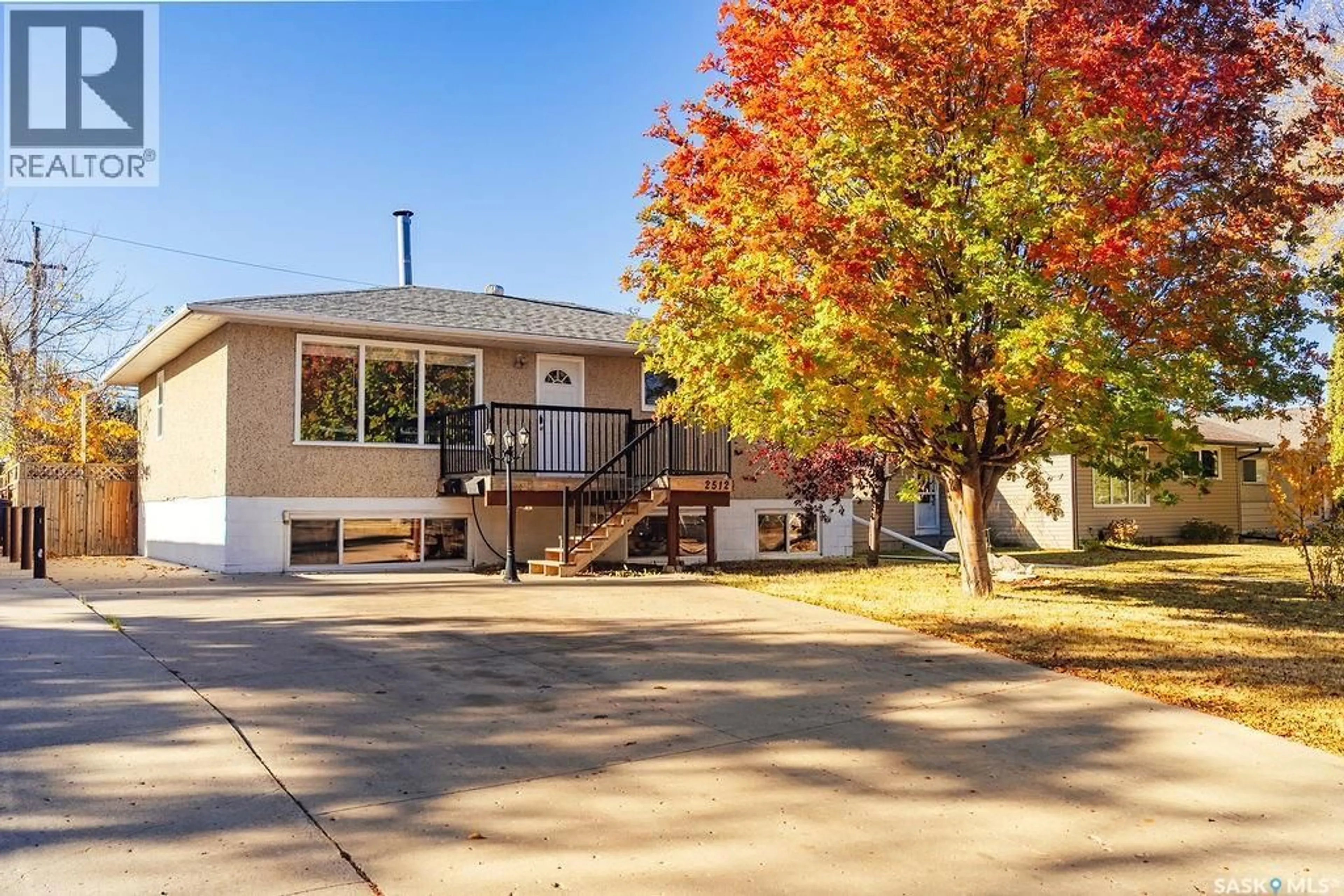 Home with vinyl exterior material, street for 2512 MELROSE AVENUE, Saskatoon Saskatchewan S7J0V6