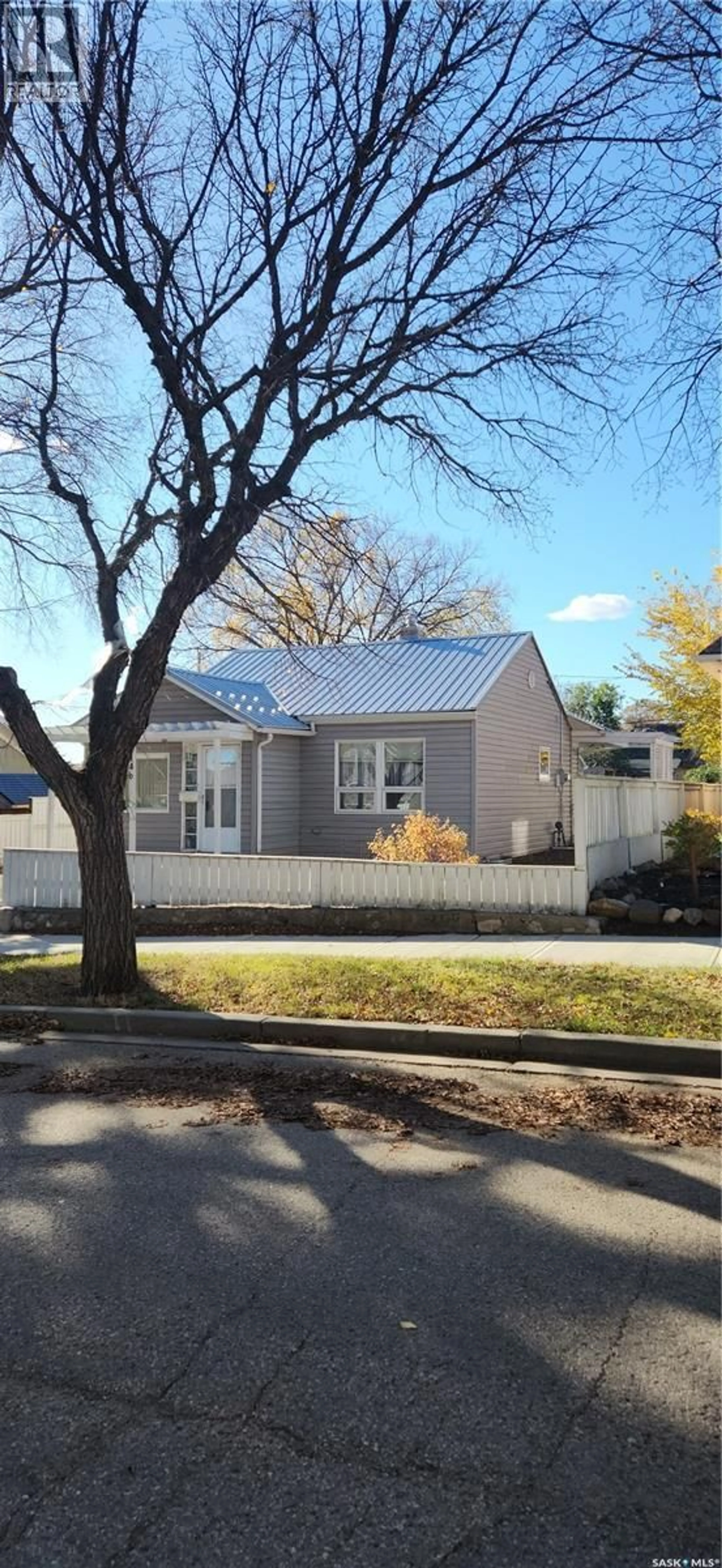 Home with vinyl exterior material, street for 1146 WILLOW AVENUE, Moose Jaw Saskatchewan S6H1G8