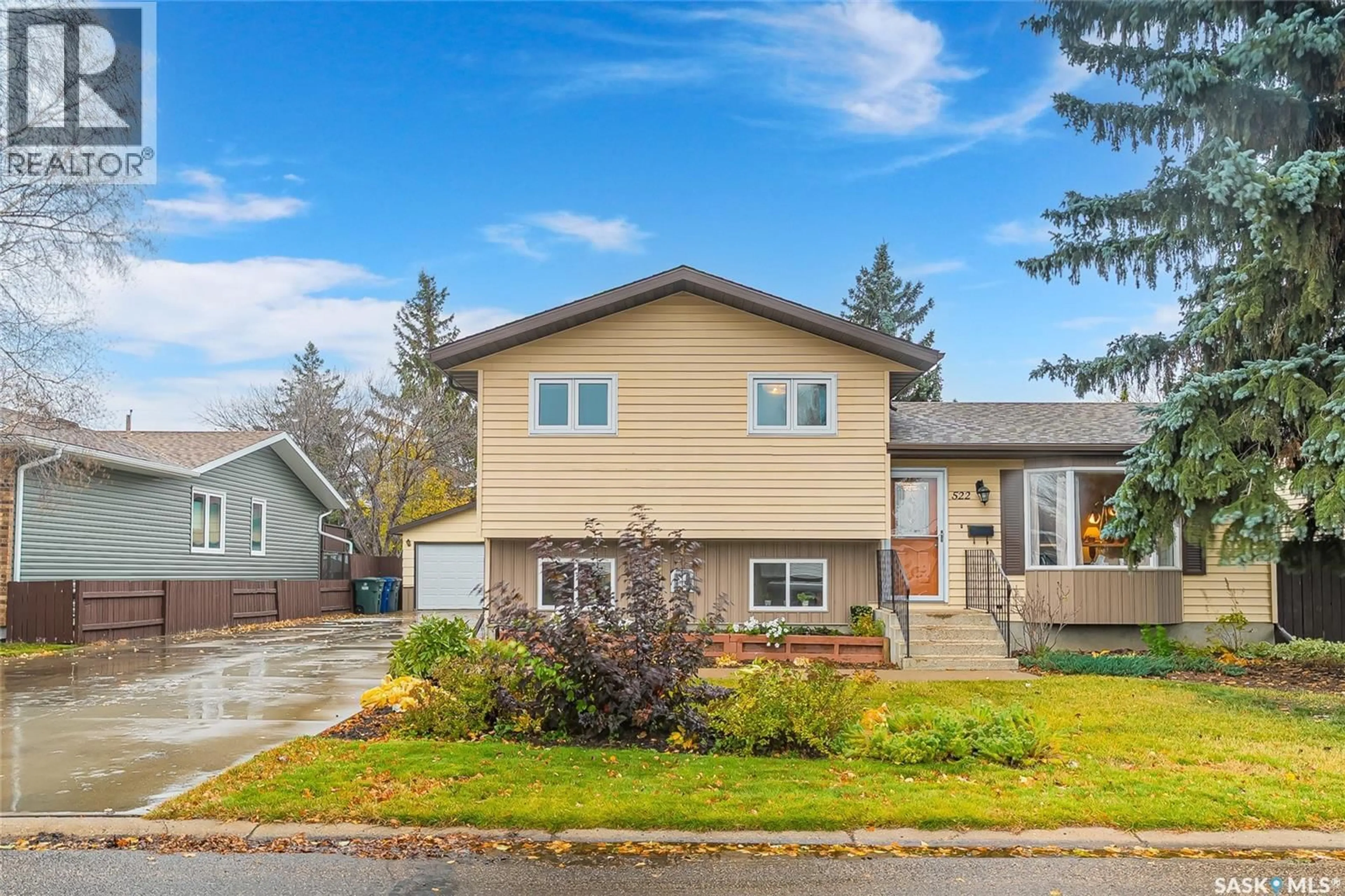Home with vinyl exterior material, street for 522 5TH STREET, Martensville Saskatchewan S0K2T0