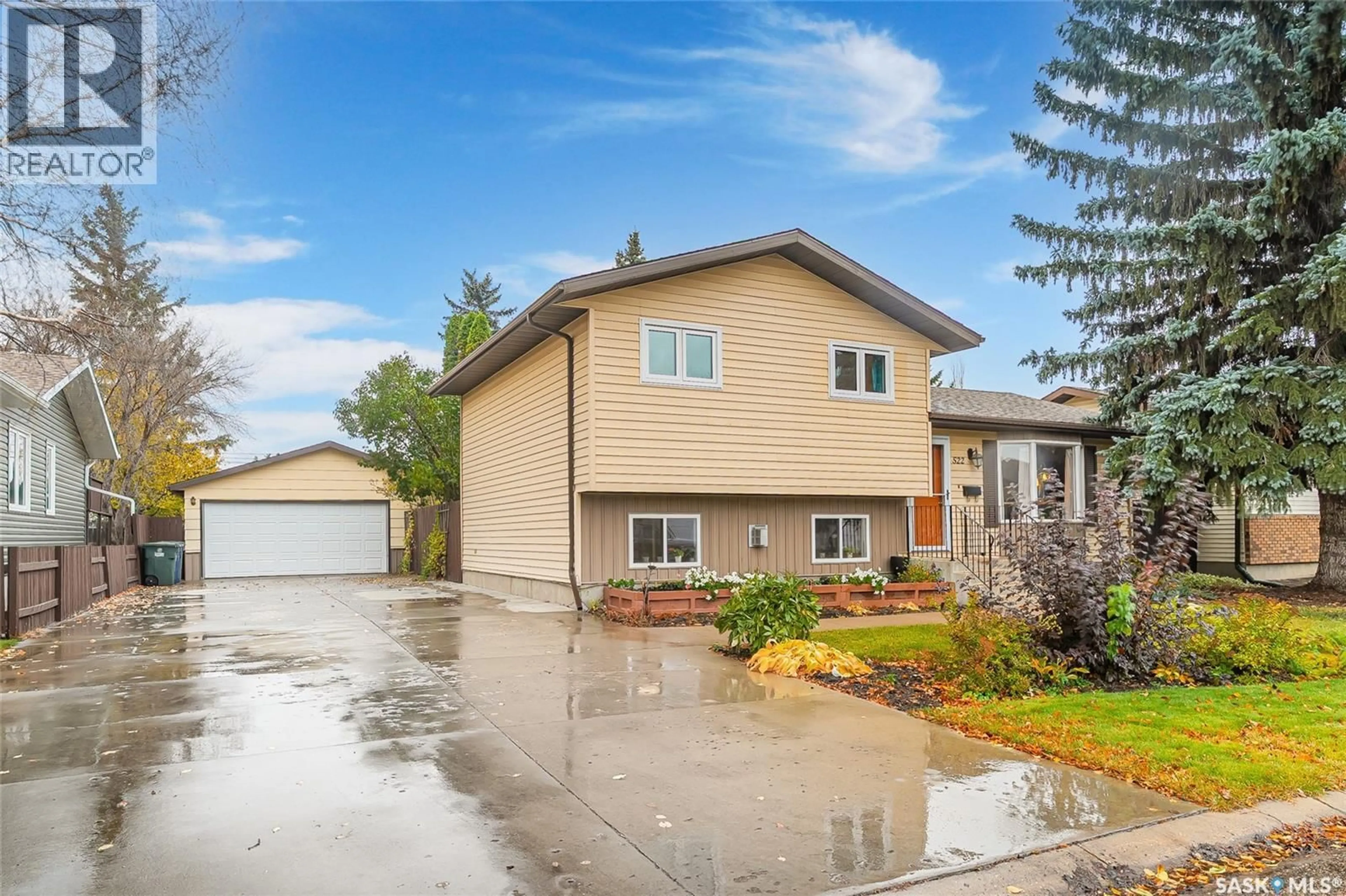Home with vinyl exterior material, street for 522 5TH STREET, Martensville Saskatchewan S0K2T0