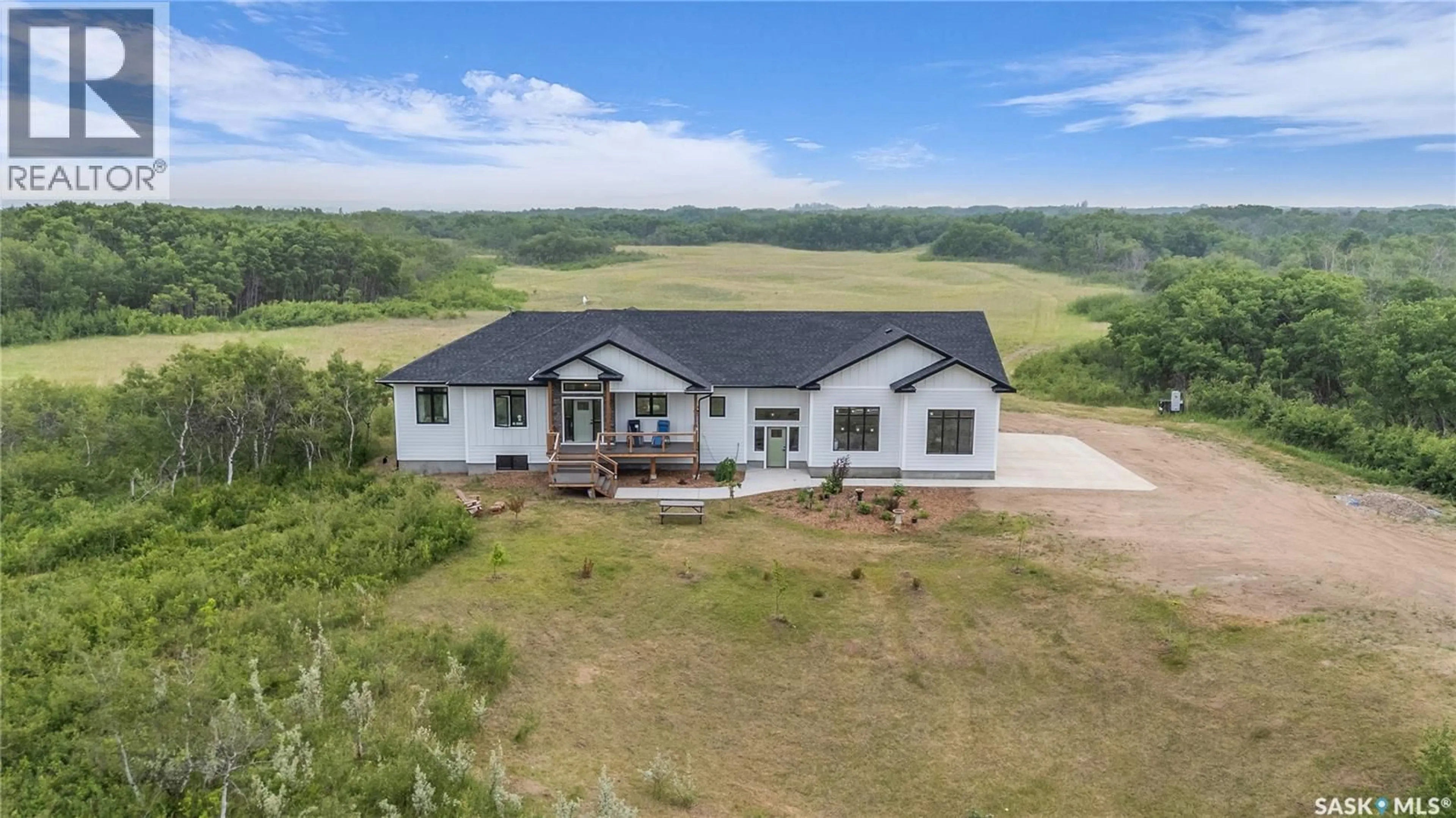 A pic from outside/outdoor area/front of a property/back of a property/a pic from drone, building for WESTON ACREAGE, Corman Park Rm No. 344 Saskatchewan S7K3J6
