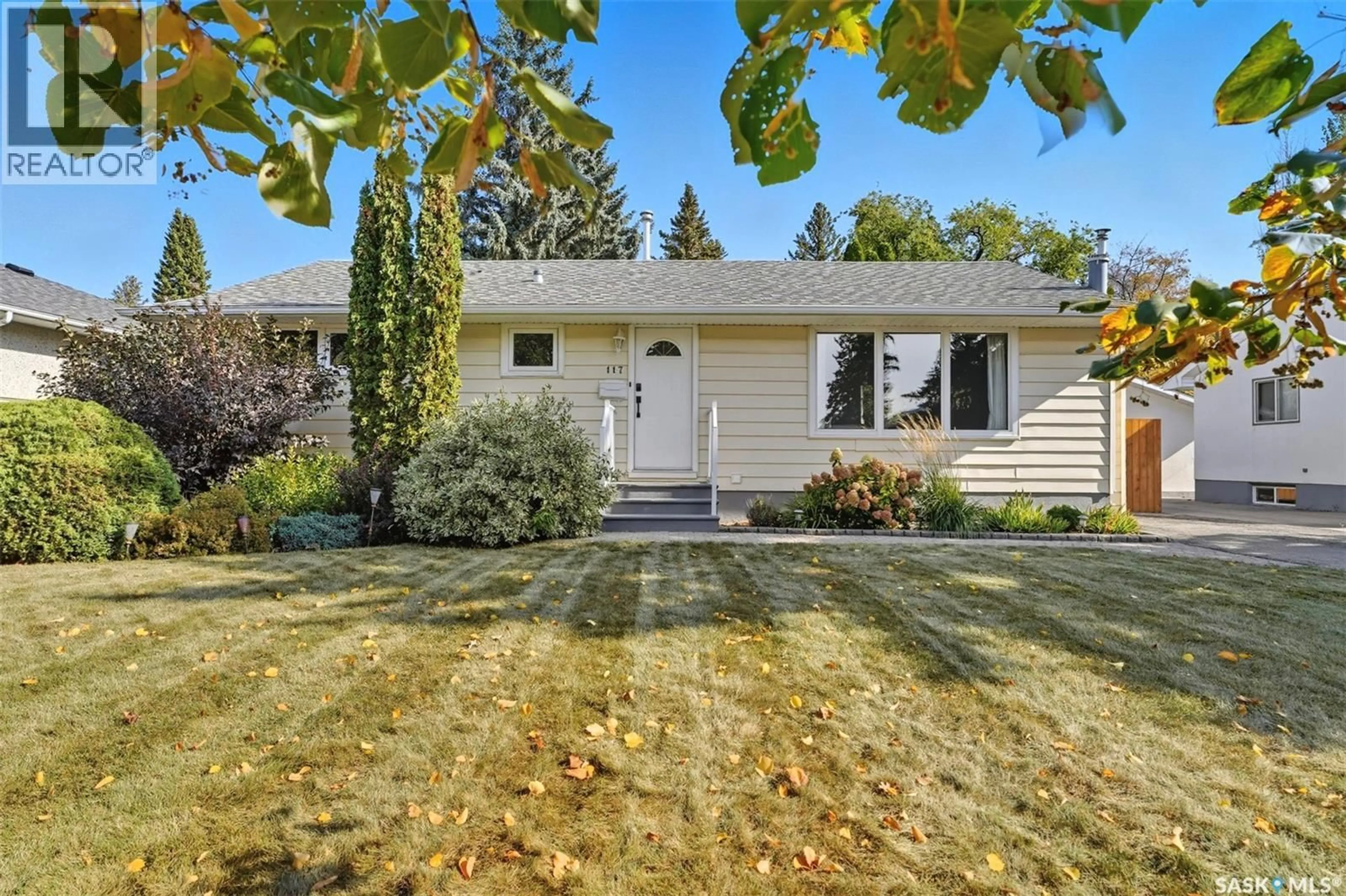 Home with vinyl exterior material, street for 117 WILSON CRESCENT, Saskatoon Saskatchewan S7J2L6