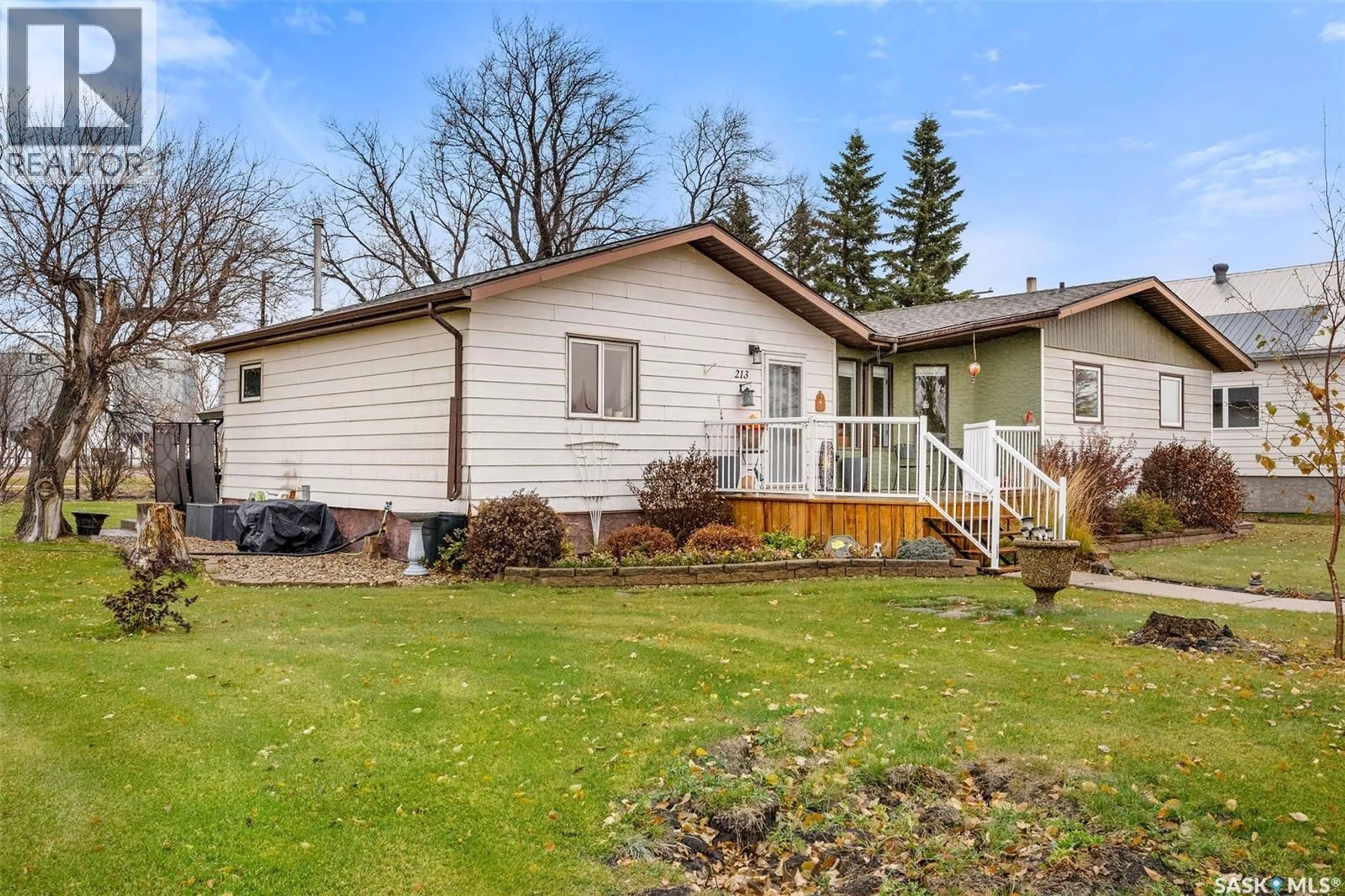 Home with vinyl exterior material, street for 213 1ST STREET, Beatty Saskatchewan S0J0C0