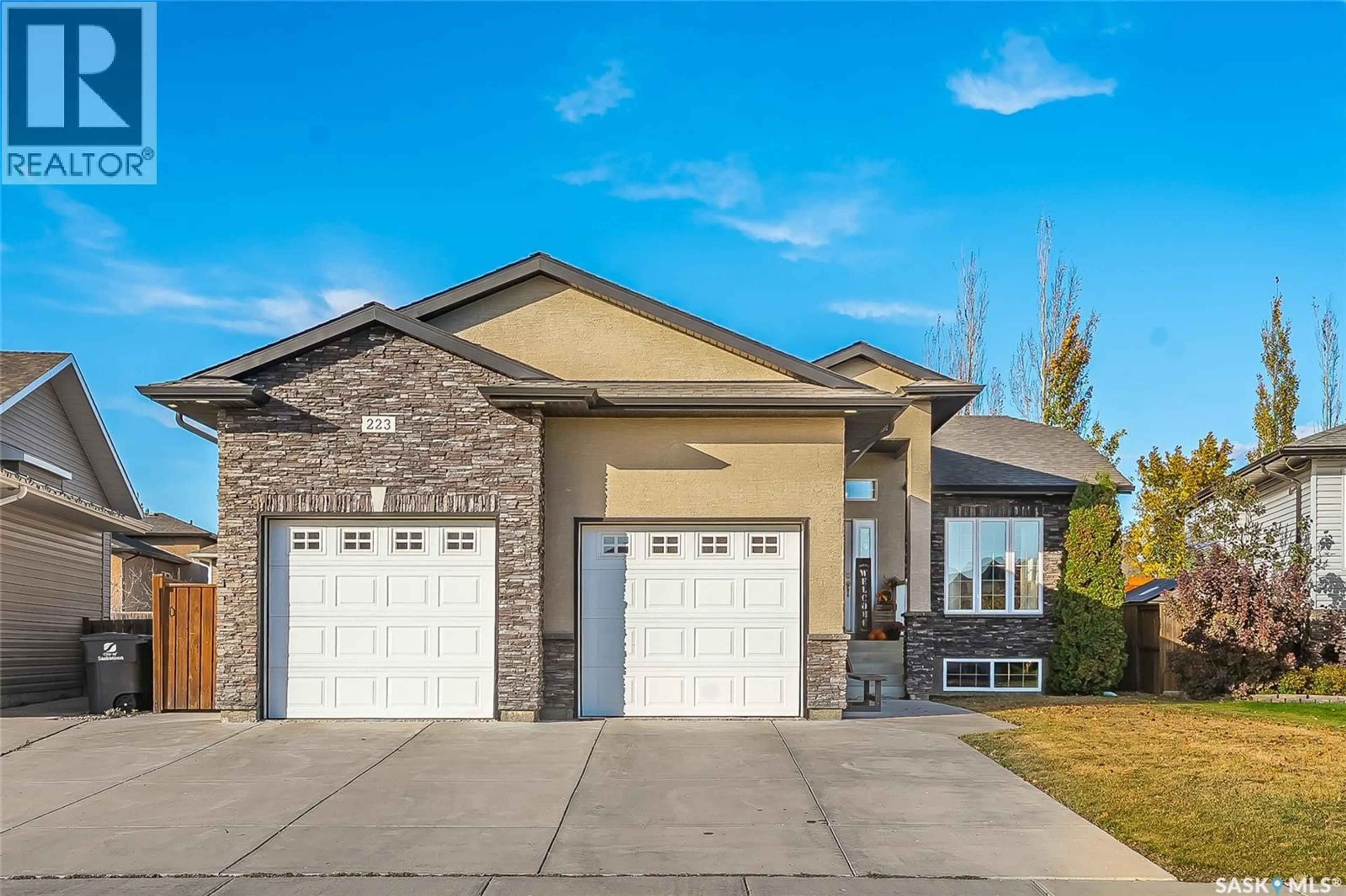 Home with vinyl exterior material, street for 223 GREENFIELD CRESCENT, Saskatoon Saskatchewan S7R0B5