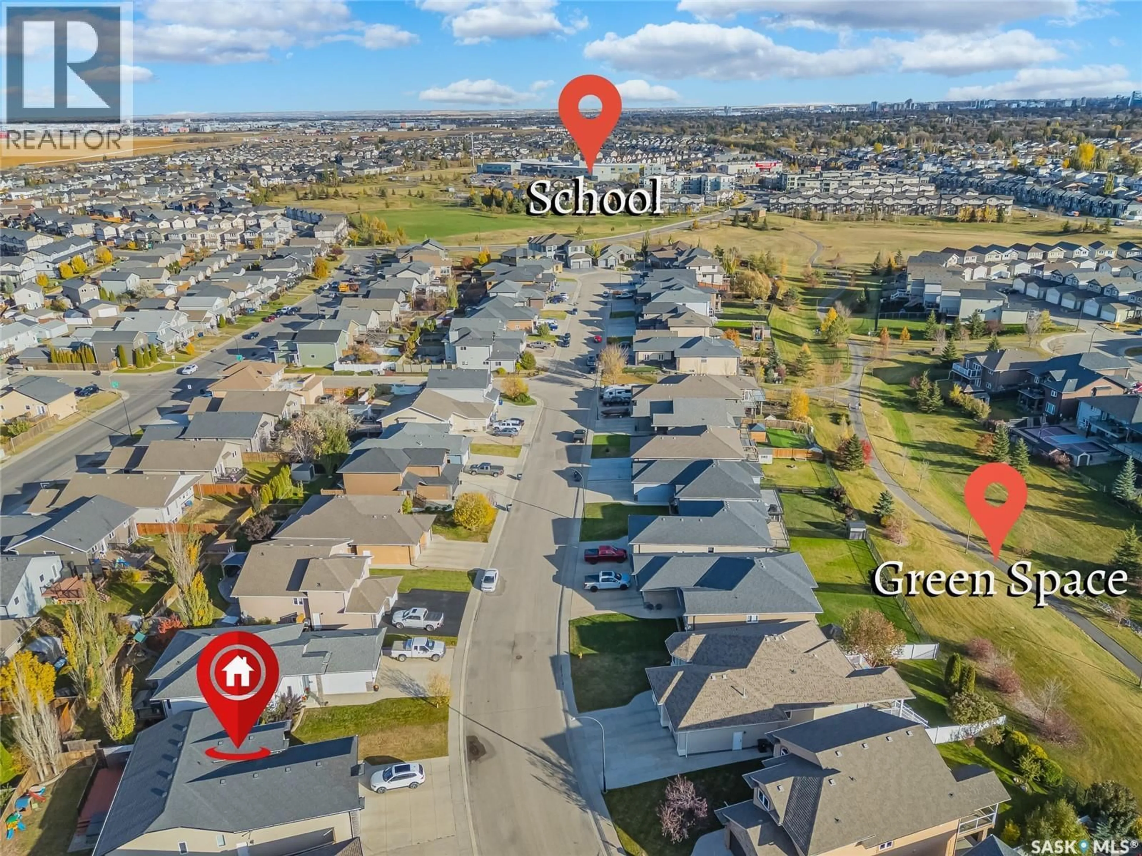 A pic from outside/outdoor area/front of a property/back of a property/a pic from drone, street for 223 GREENFIELD CRESCENT, Saskatoon Saskatchewan S7R0B5