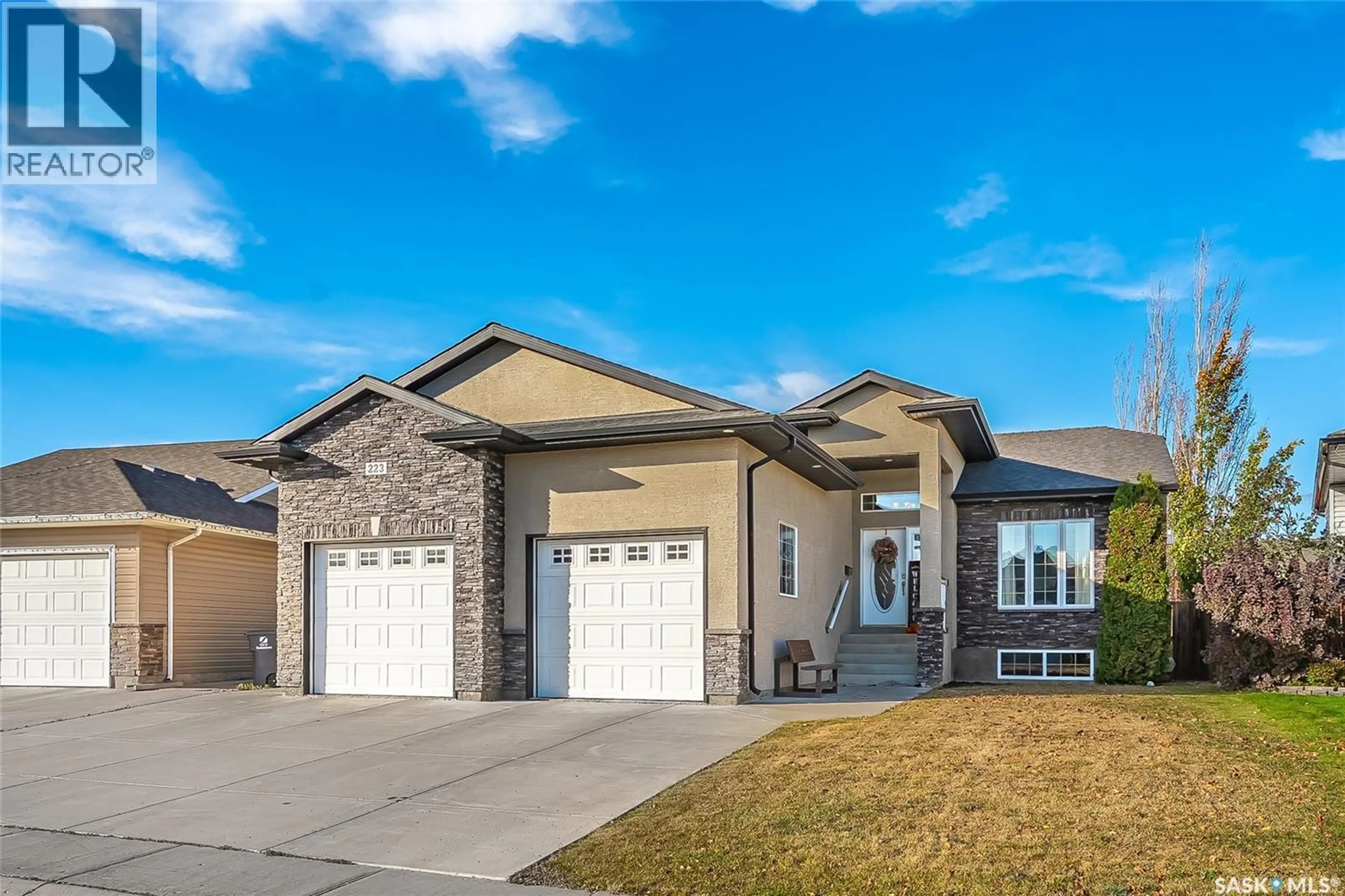 Home with brick exterior material, street for 223 GREENFIELD CRESCENT, Saskatoon Saskatchewan S7R0B5