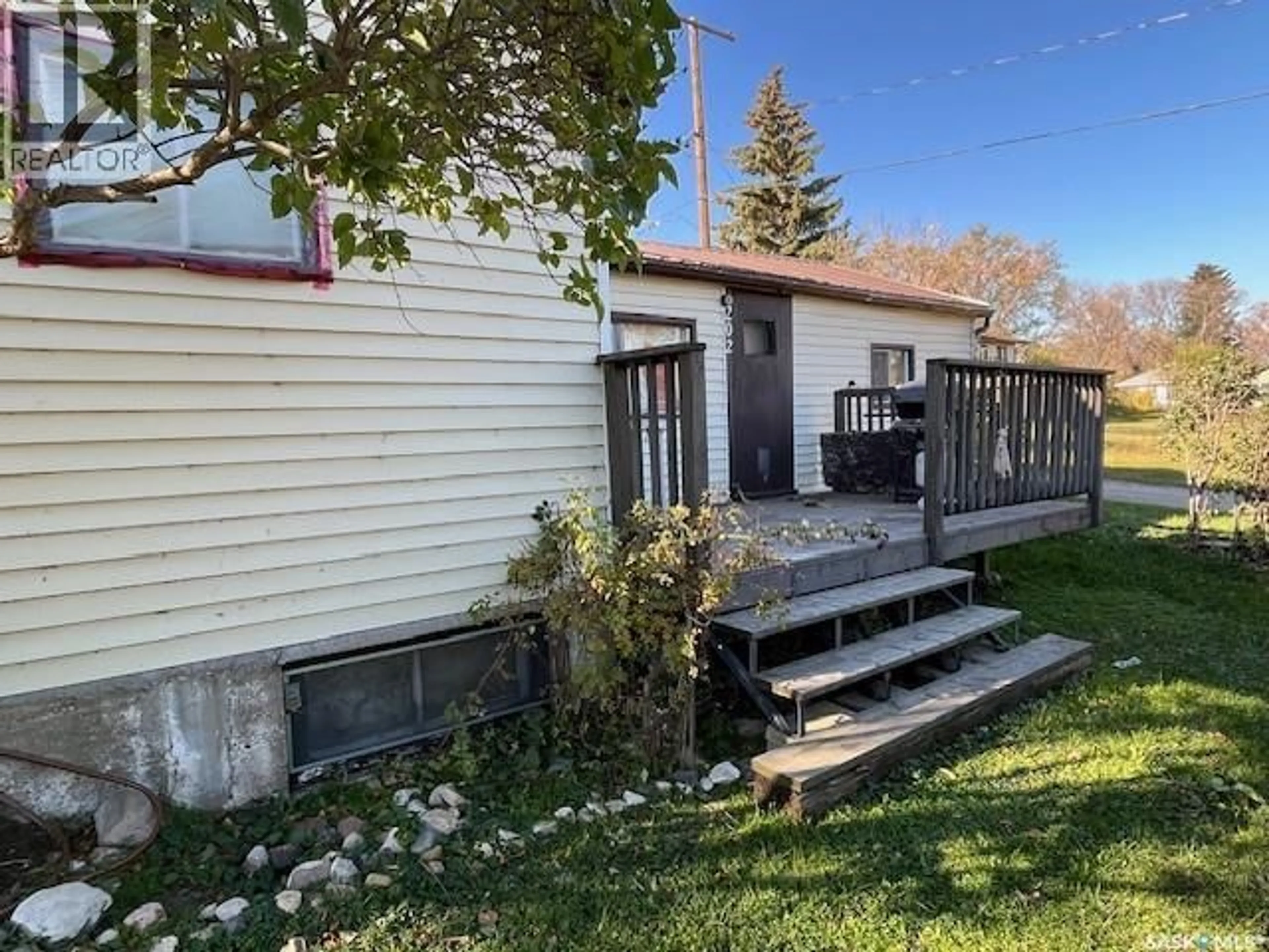 A pic from outside/outdoor area/front of a property/back of a property/a pic from drone, street for 202 3RD AVENUE, Young Saskatchewan S0K4Y0
