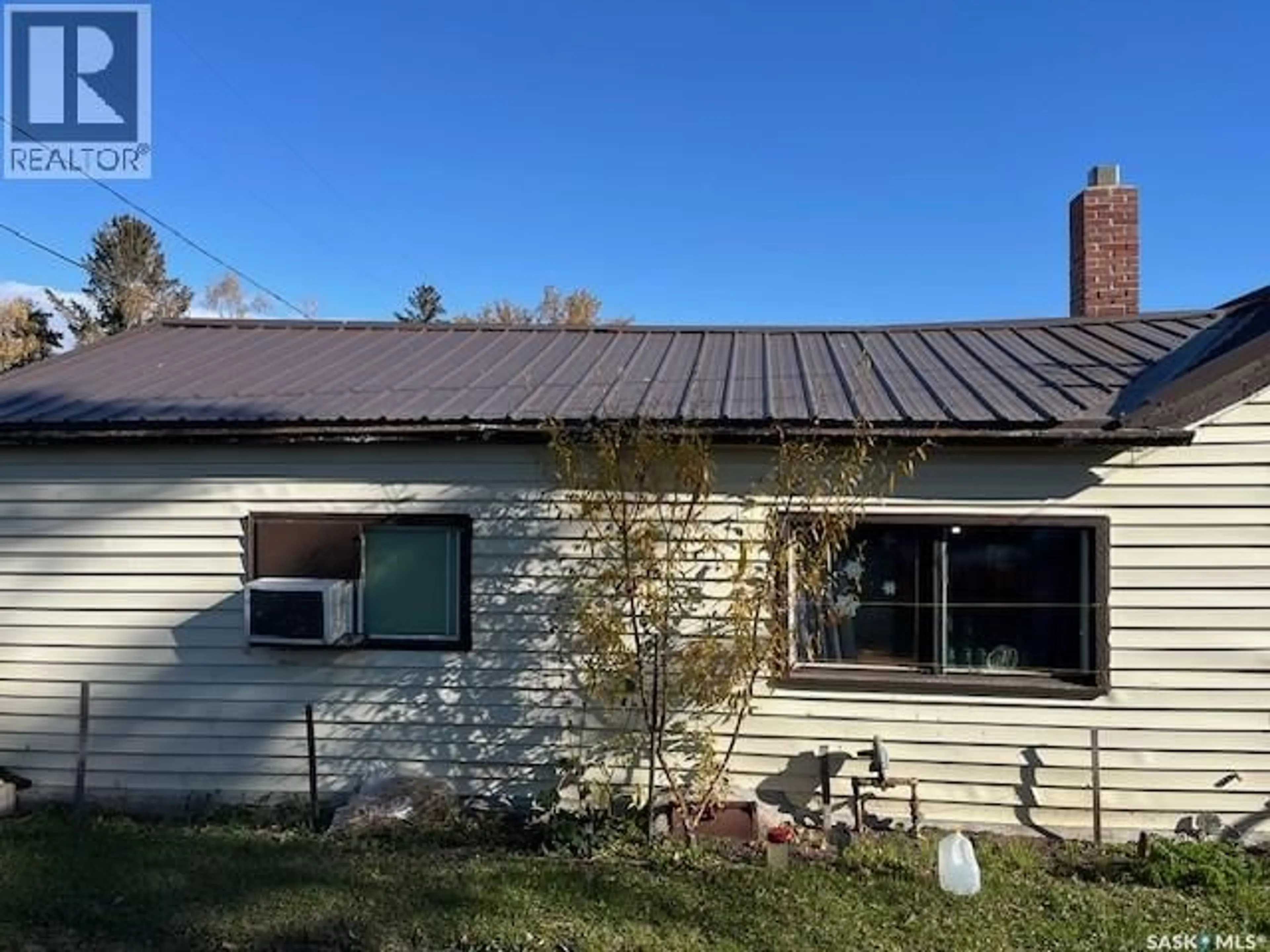 Home with vinyl exterior material, building for 202 3RD AVENUE, Young Saskatchewan S0K4Y0