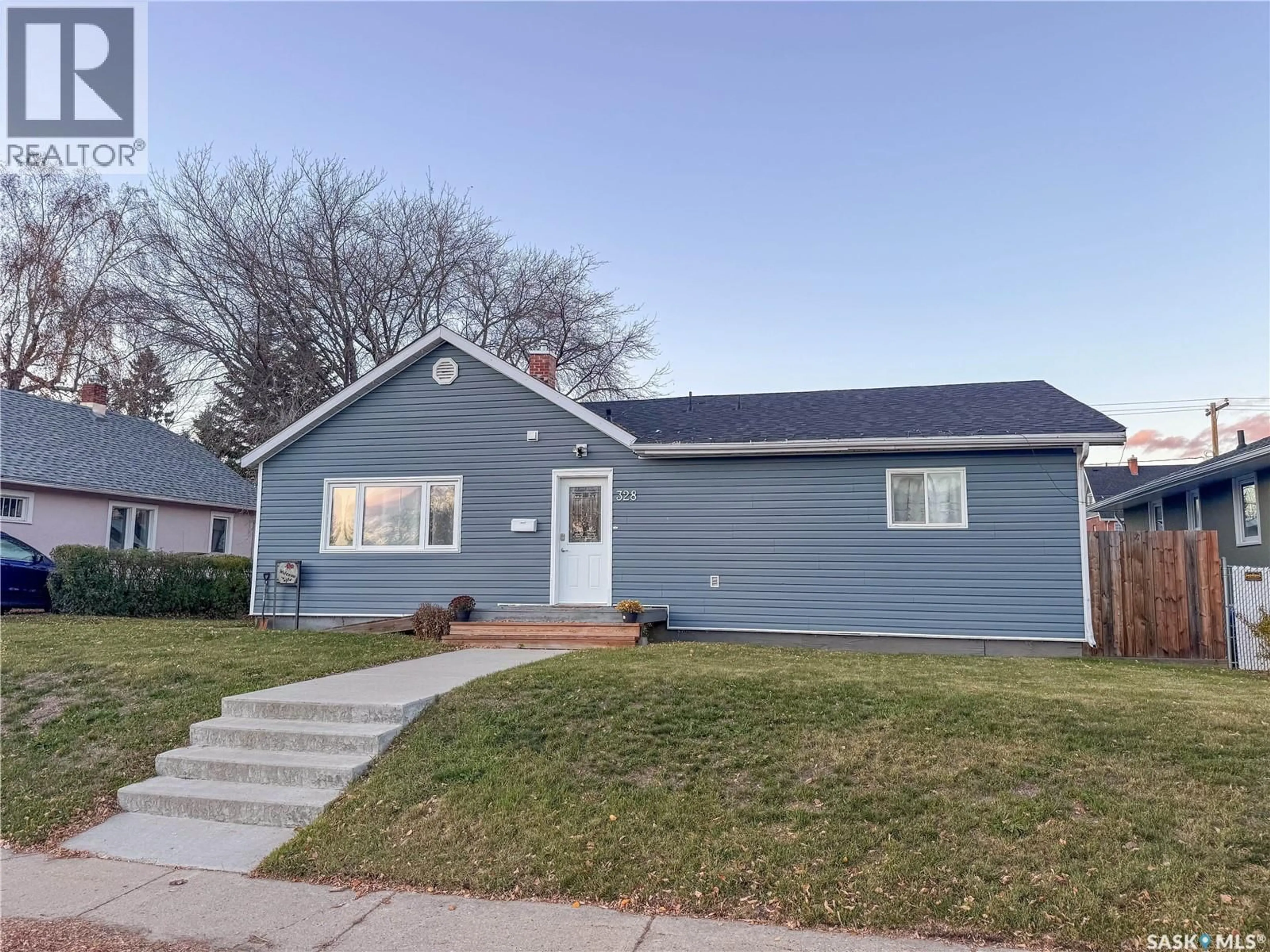 Home with vinyl exterior material, street for 328 23RD STREET, Prince Albert Saskatchewan S6V1P7