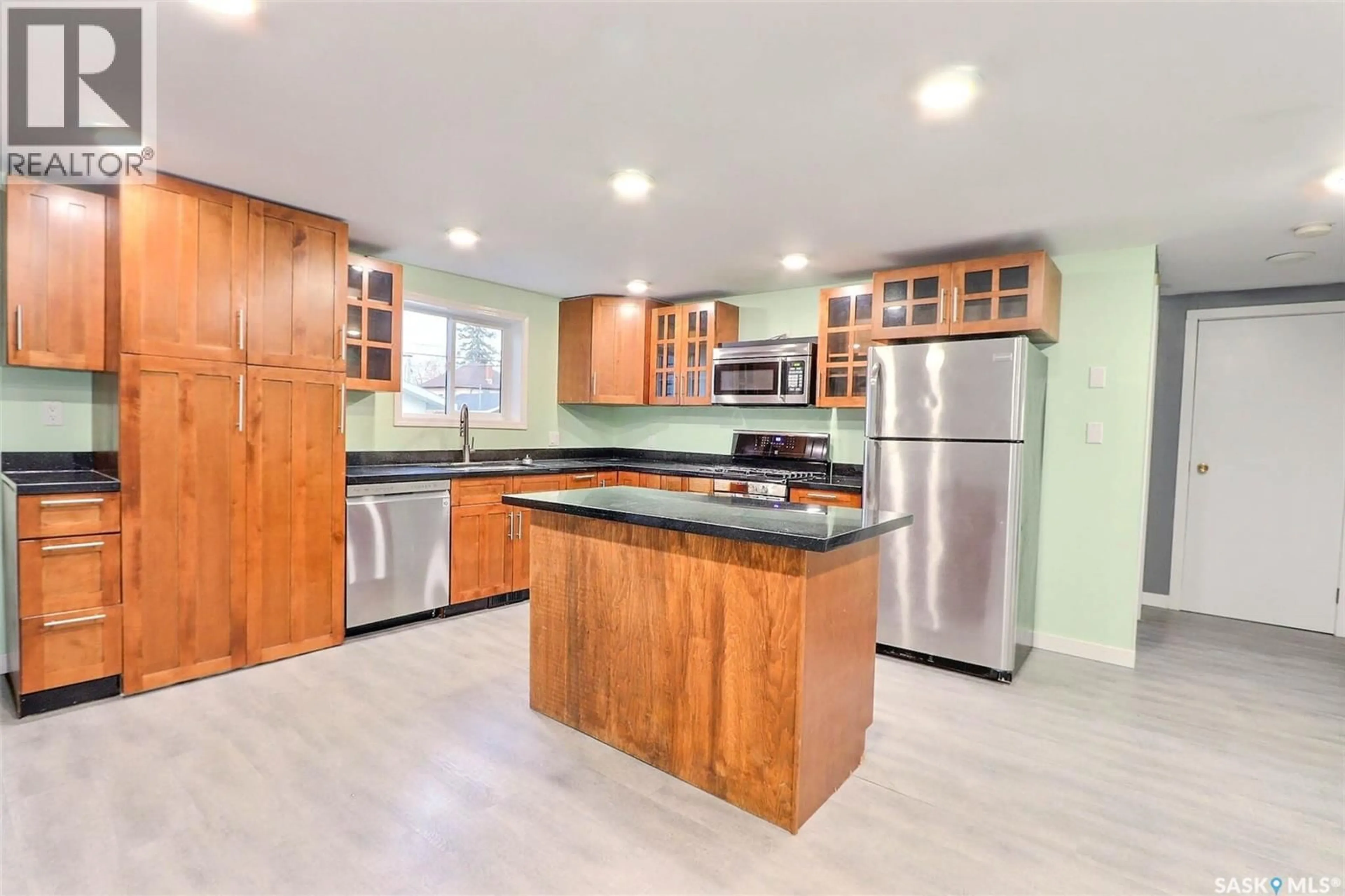 Open concept kitchen, ceramic/tile floor for 328 23RD STREET, Prince Albert Saskatchewan S6V1P7
