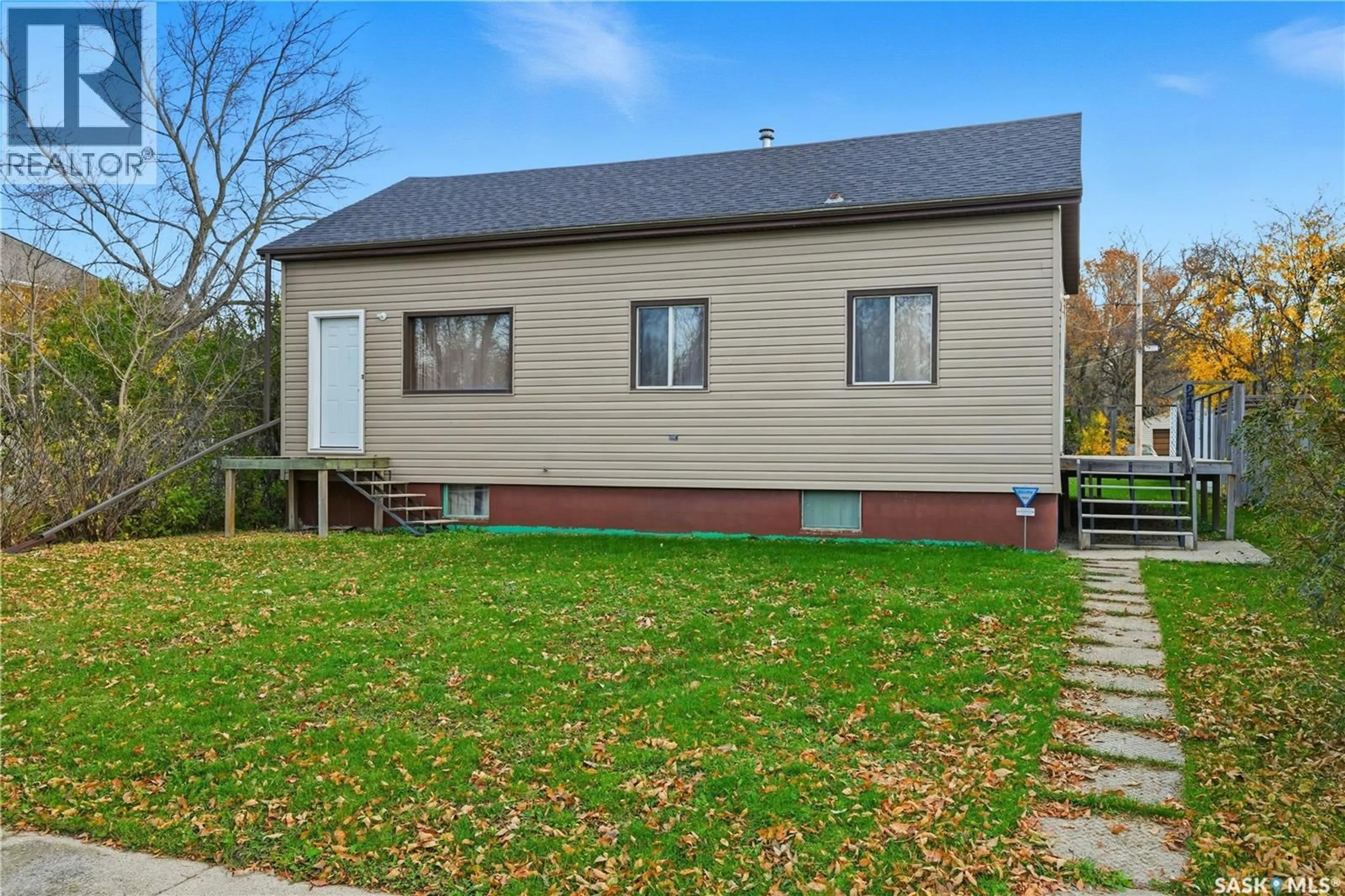 Home with vinyl exterior material, street for 215 CAMPKIN STREET, Francis Saskatchewan S0G1V0