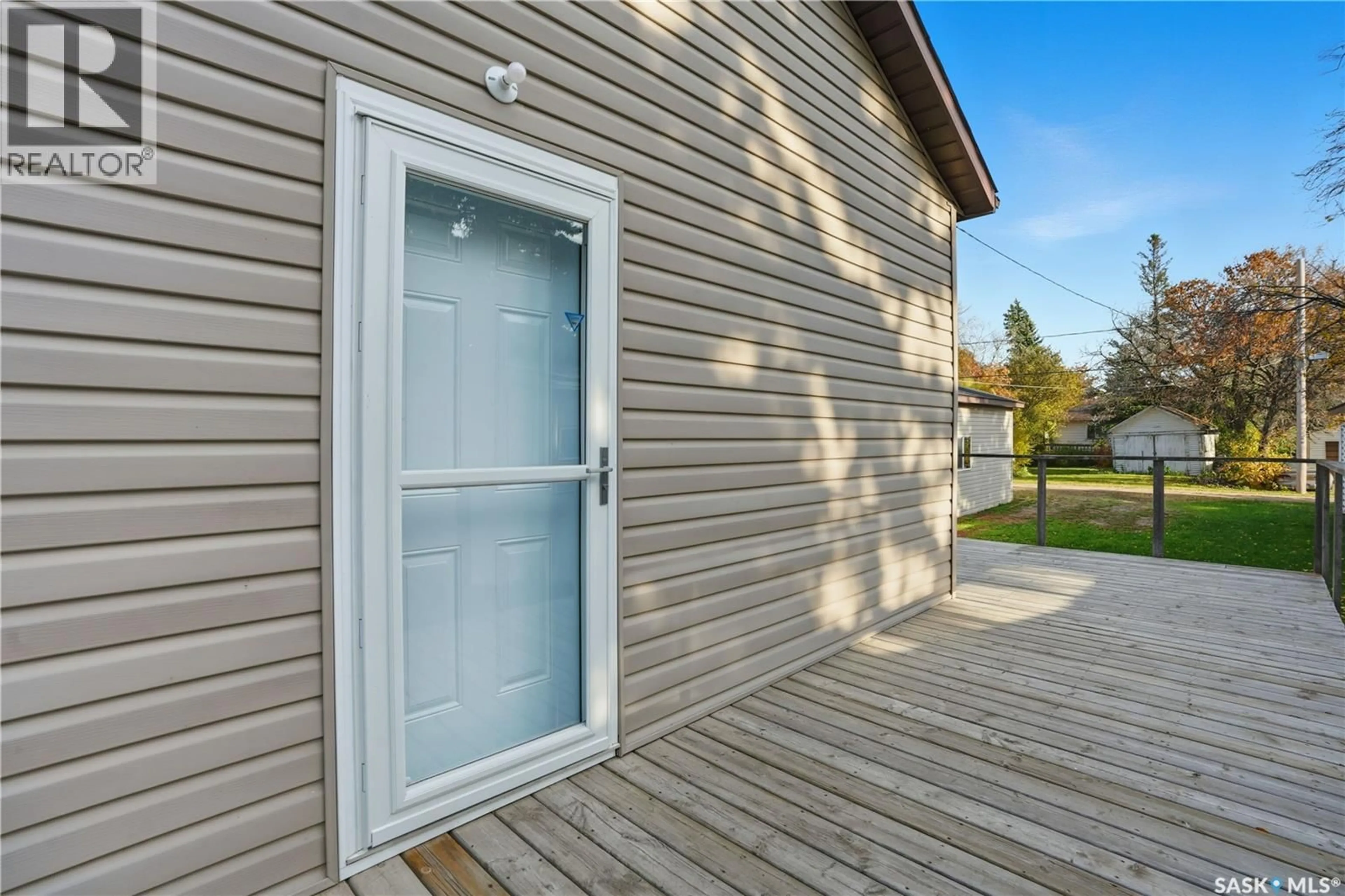 Home with vinyl exterior material, street for 215 CAMPKIN STREET, Francis Saskatchewan S0G1V0
