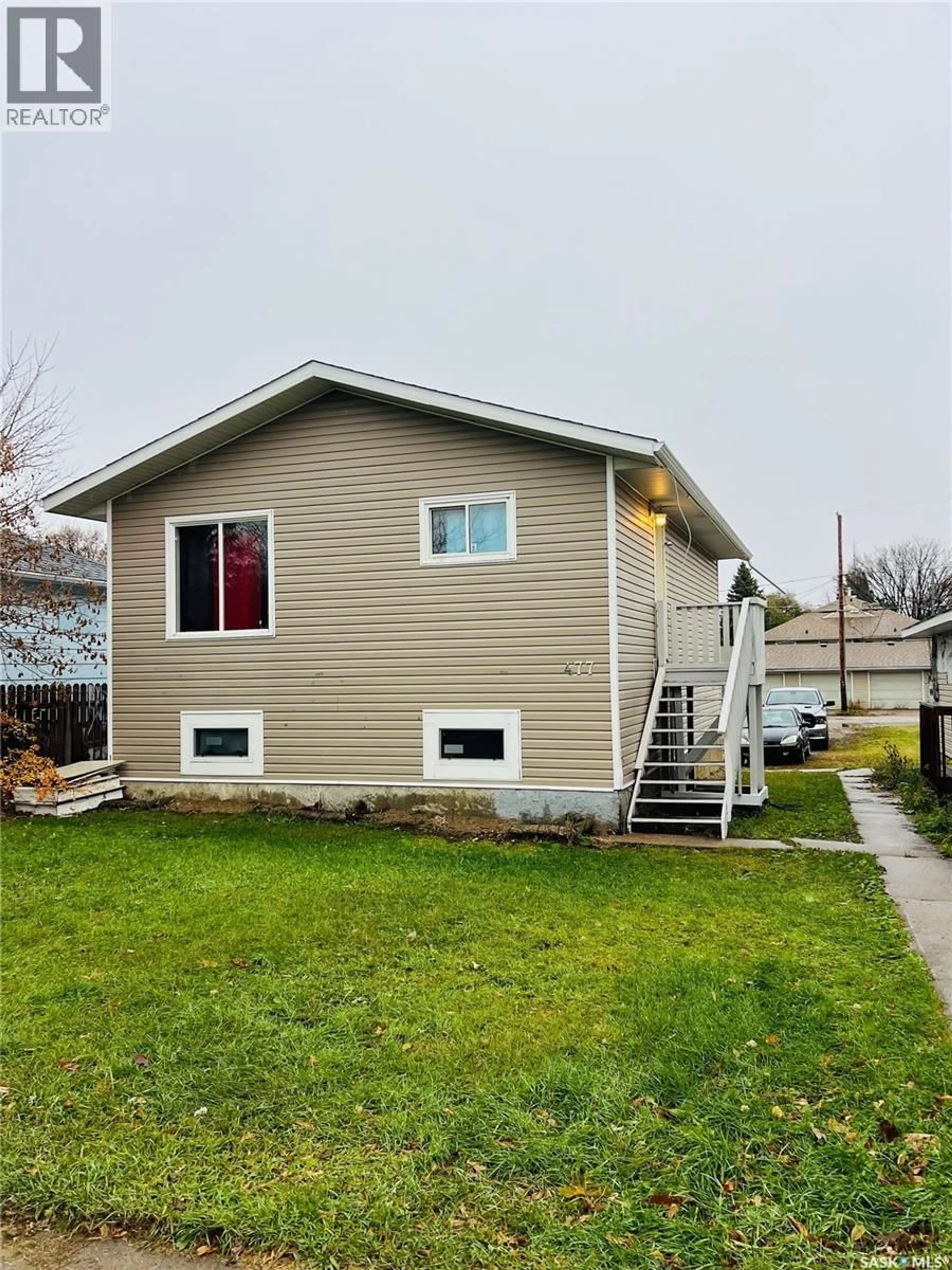Home with vinyl exterior material, street for 477 7TH STREET, Prince Albert Saskatchewan S6V0S4