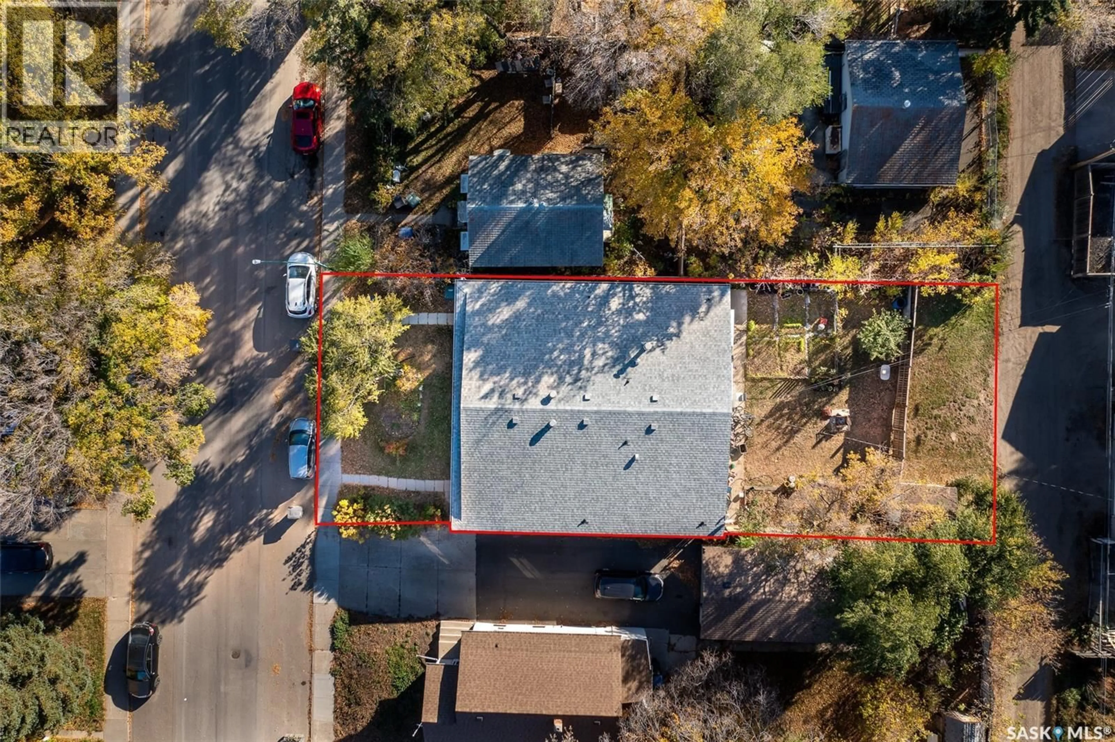 A pic from outside/outdoor area/front of a property/back of a property/a pic from drone, street for 309 / 311 Y AVENUE, Saskatoon Saskatchewan S7M3J6