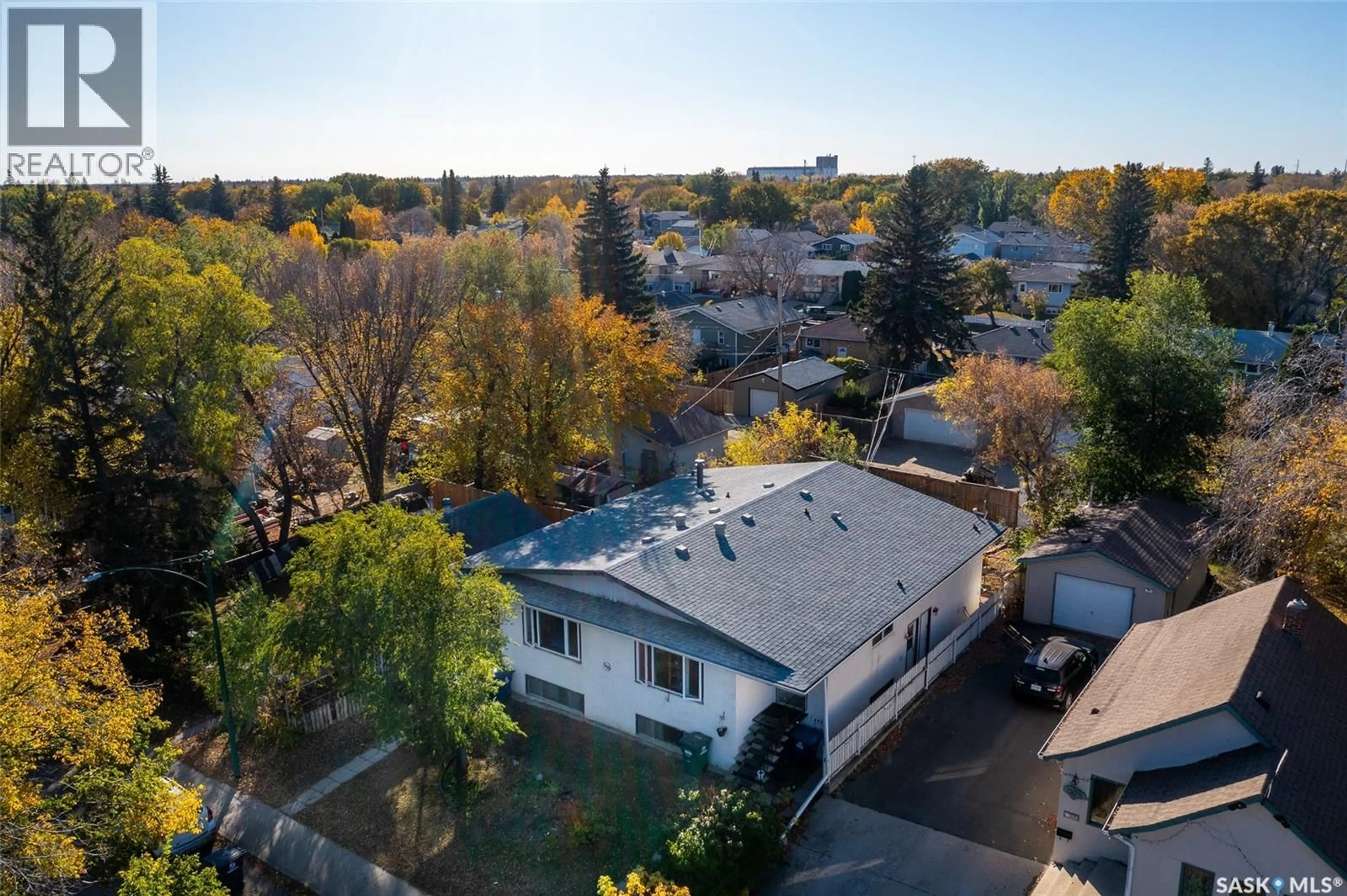A pic from outside/outdoor area/front of a property/back of a property/a pic from drone, street for 309 / 311 Y AVENUE, Saskatoon Saskatchewan S7M3J6