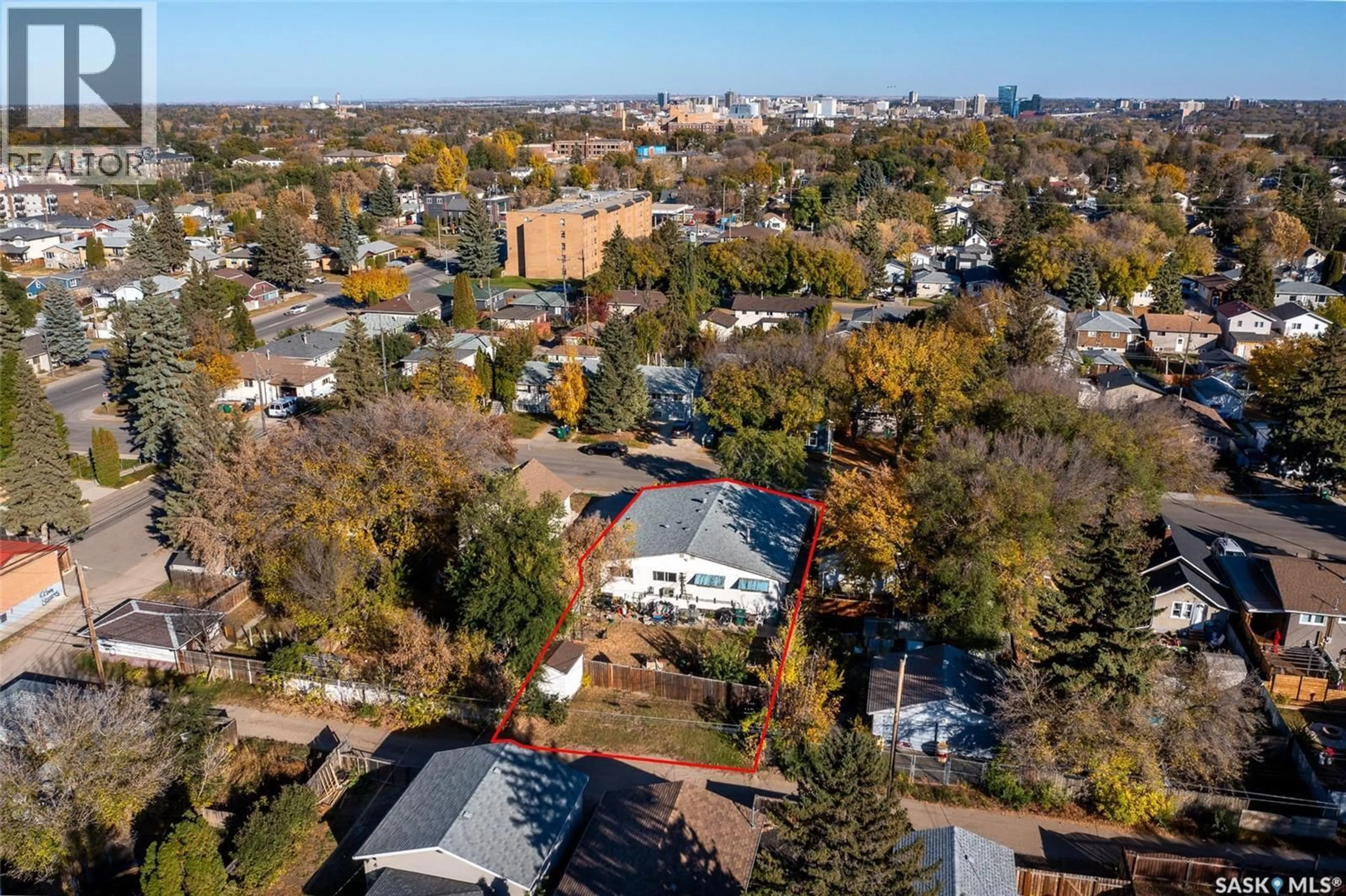 A pic from outside/outdoor area/front of a property/back of a property/a pic from drone, street for 309 / 311 Y AVENUE, Saskatoon Saskatchewan S7M3J6