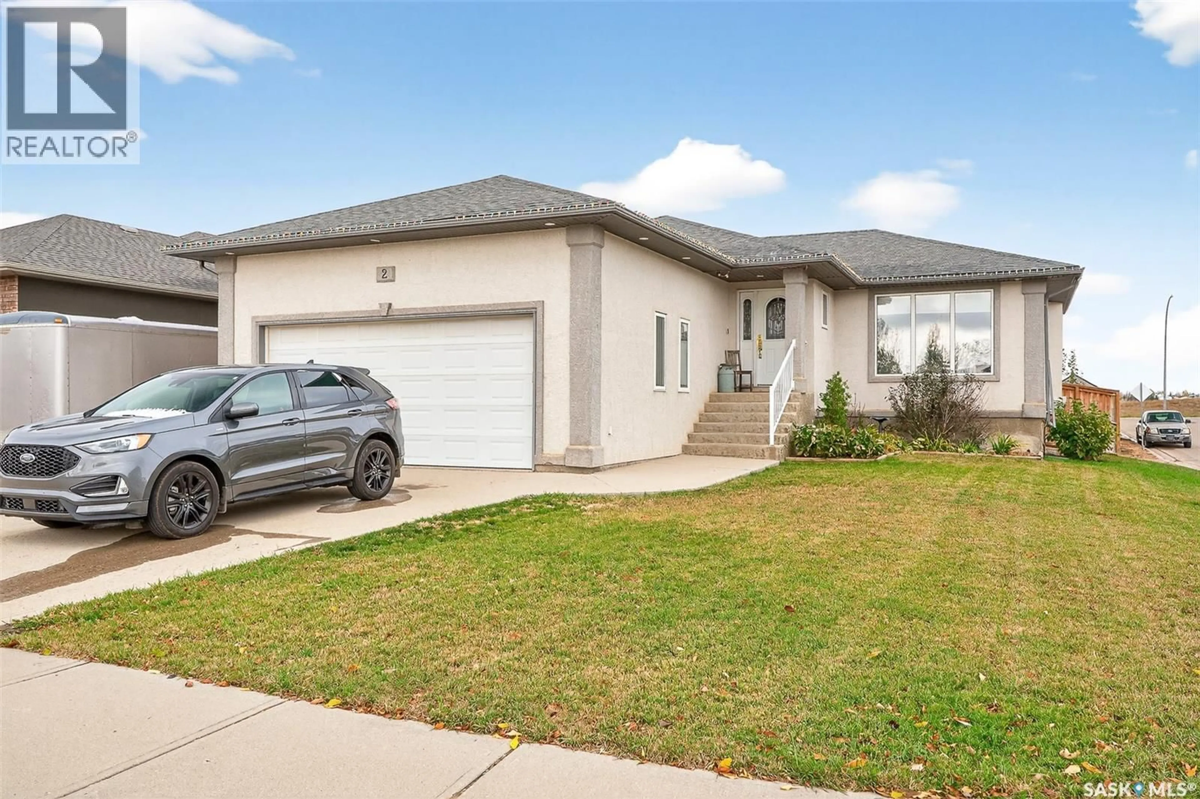 Home with vinyl exterior material, street for 2 BELMONT CRESCENT, Moose Jaw Saskatchewan S6K1C5
