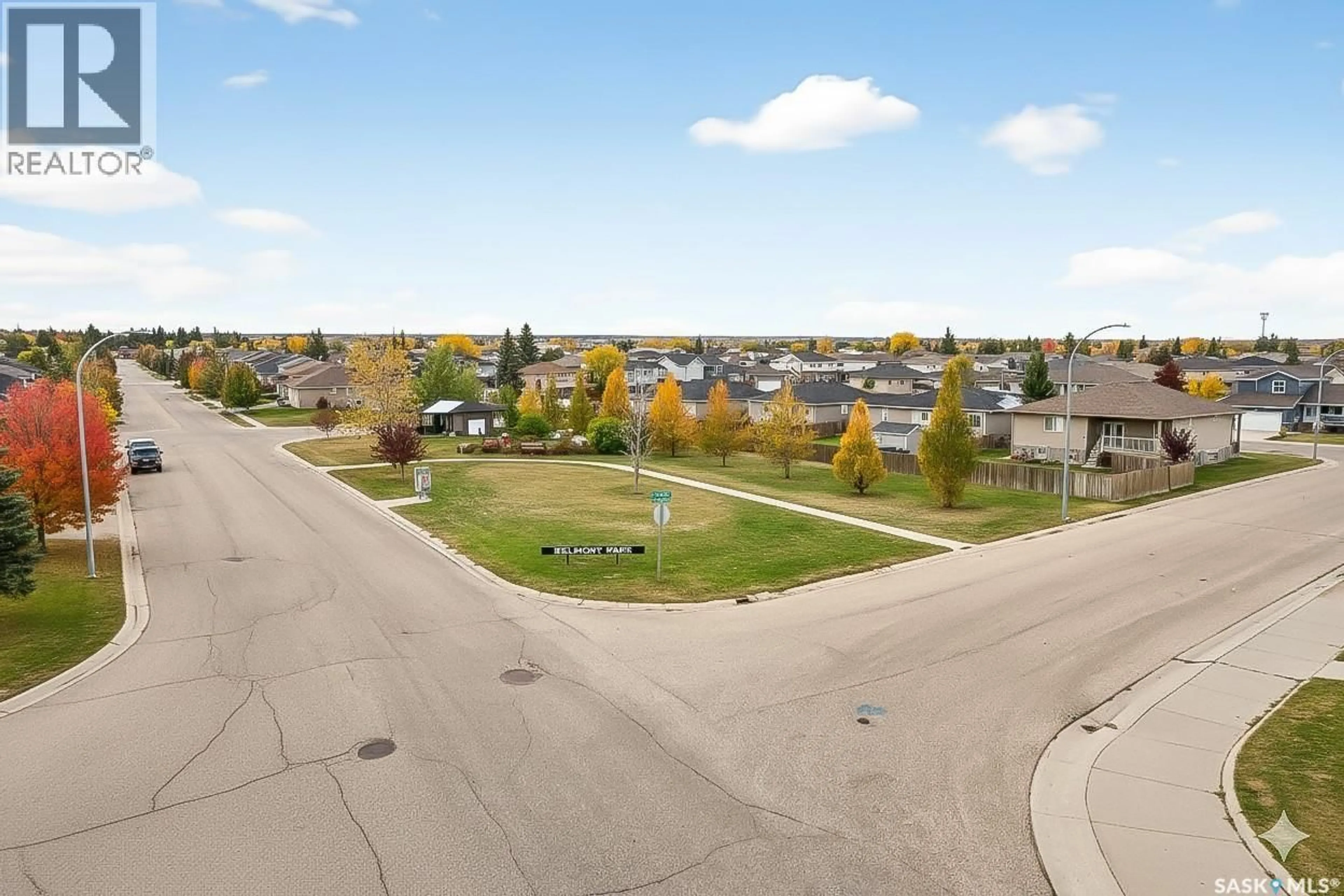 A pic from outside/outdoor area/front of a property/back of a property/a pic from drone, street for 2 BELMONT CRESCENT, Moose Jaw Saskatchewan S6K1C5