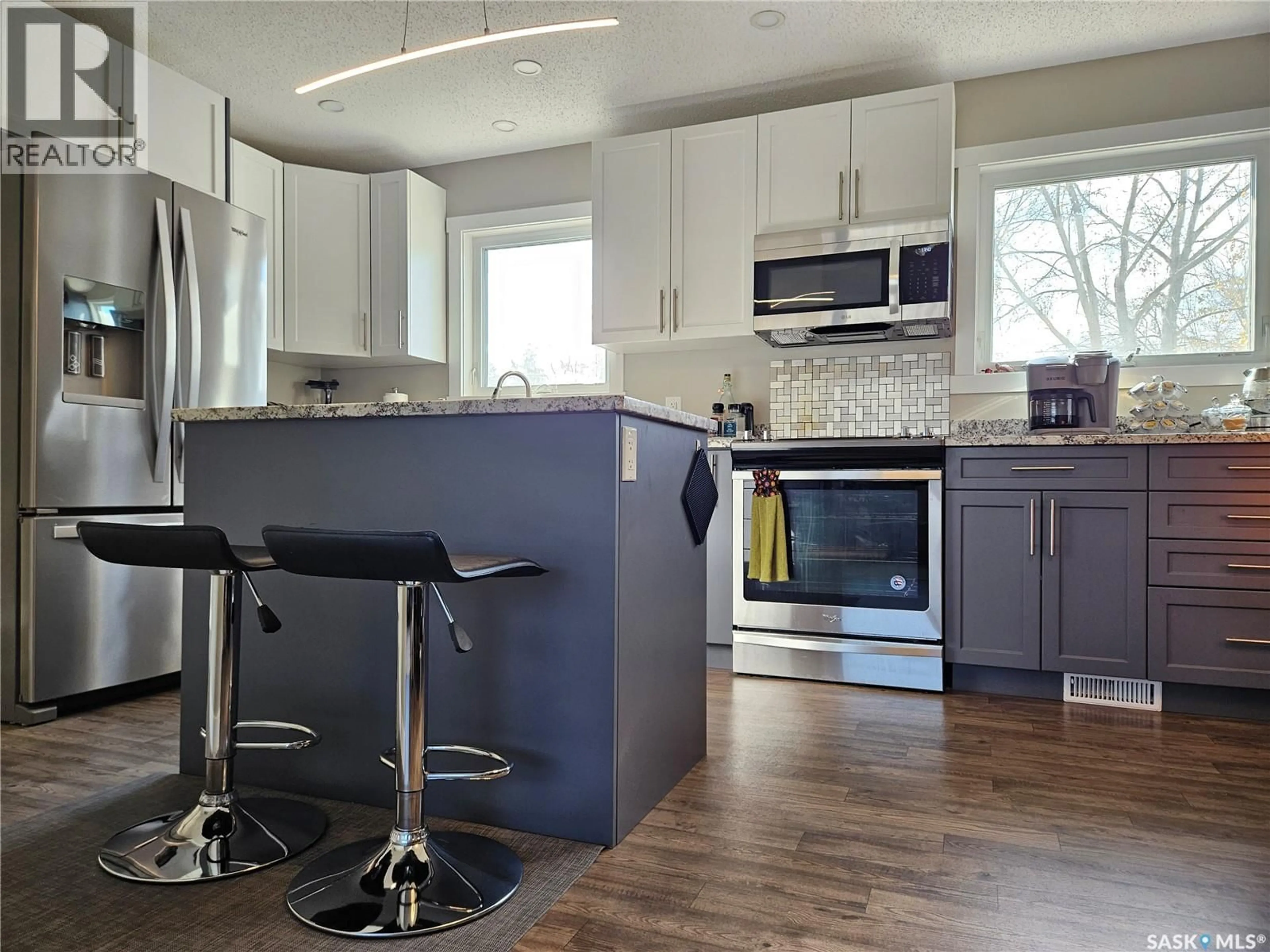 Open concept kitchen, unknown for 1010 101ST AVENUE, Tisdale Saskatchewan S0E1T0