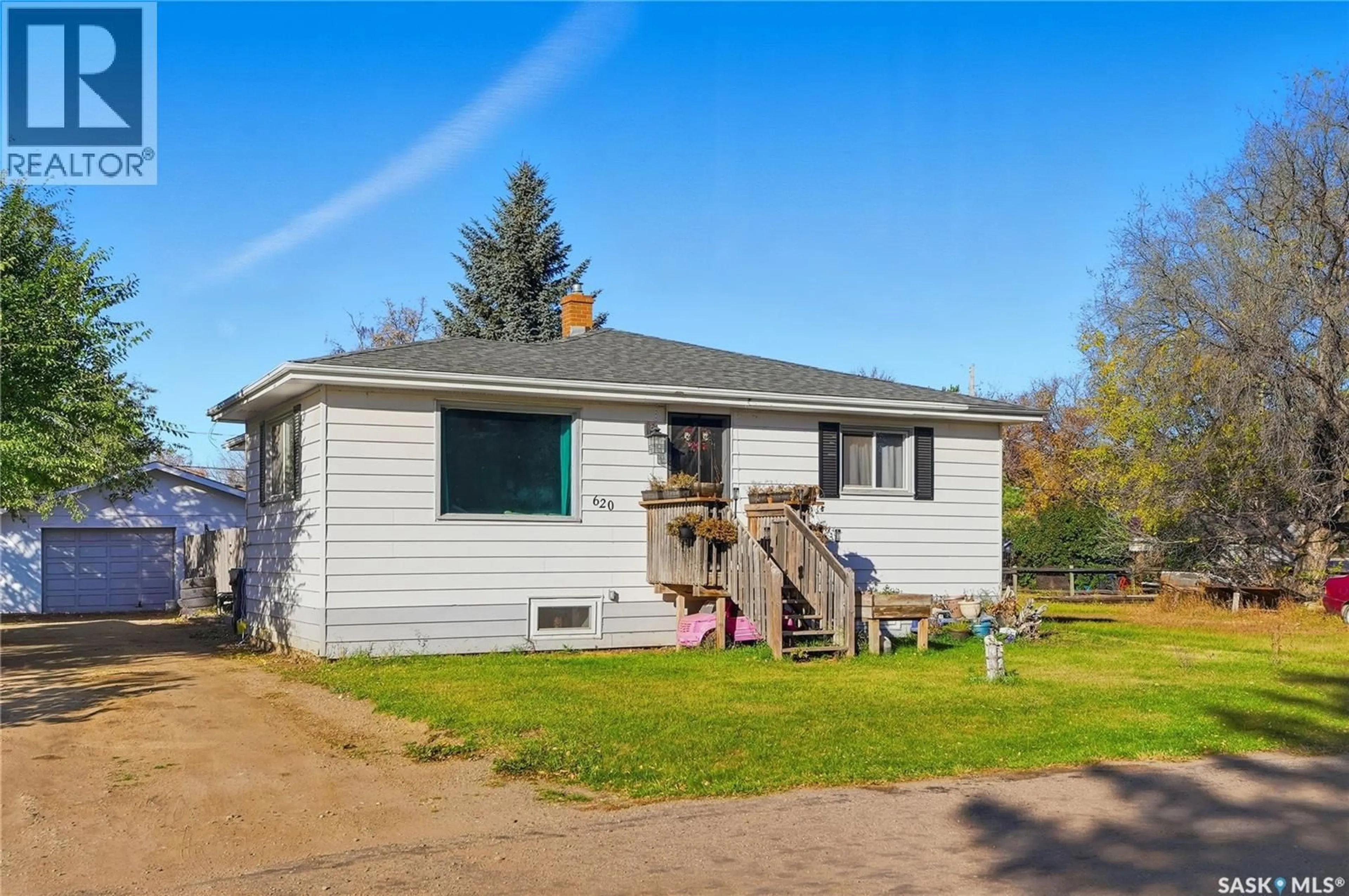 Home with vinyl exterior material, street for 620 MILES STREET, Asquith Saskatchewan S0K0J0