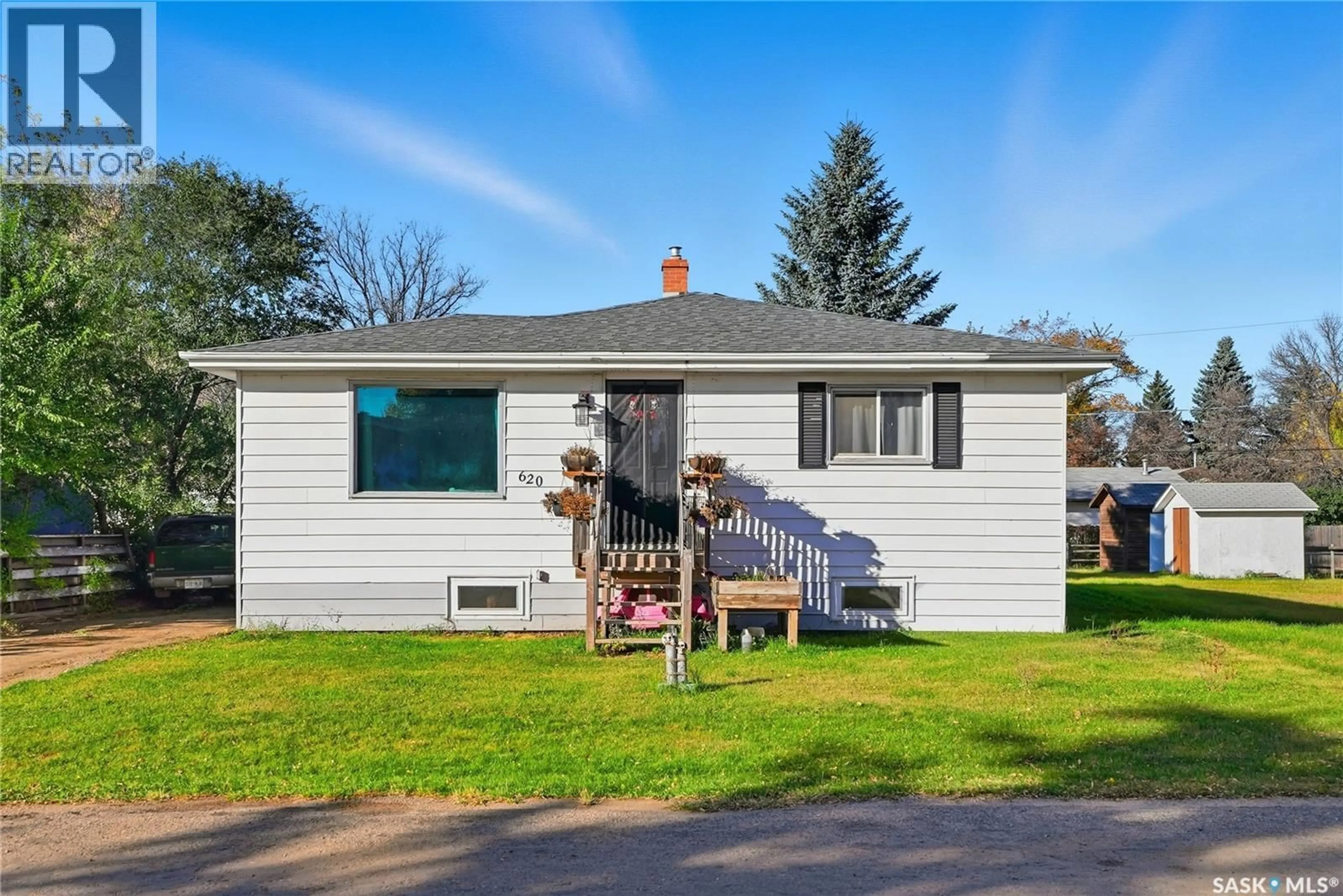 Home with vinyl exterior material, street for 620 MILES STREET, Asquith Saskatchewan S0K0J0
