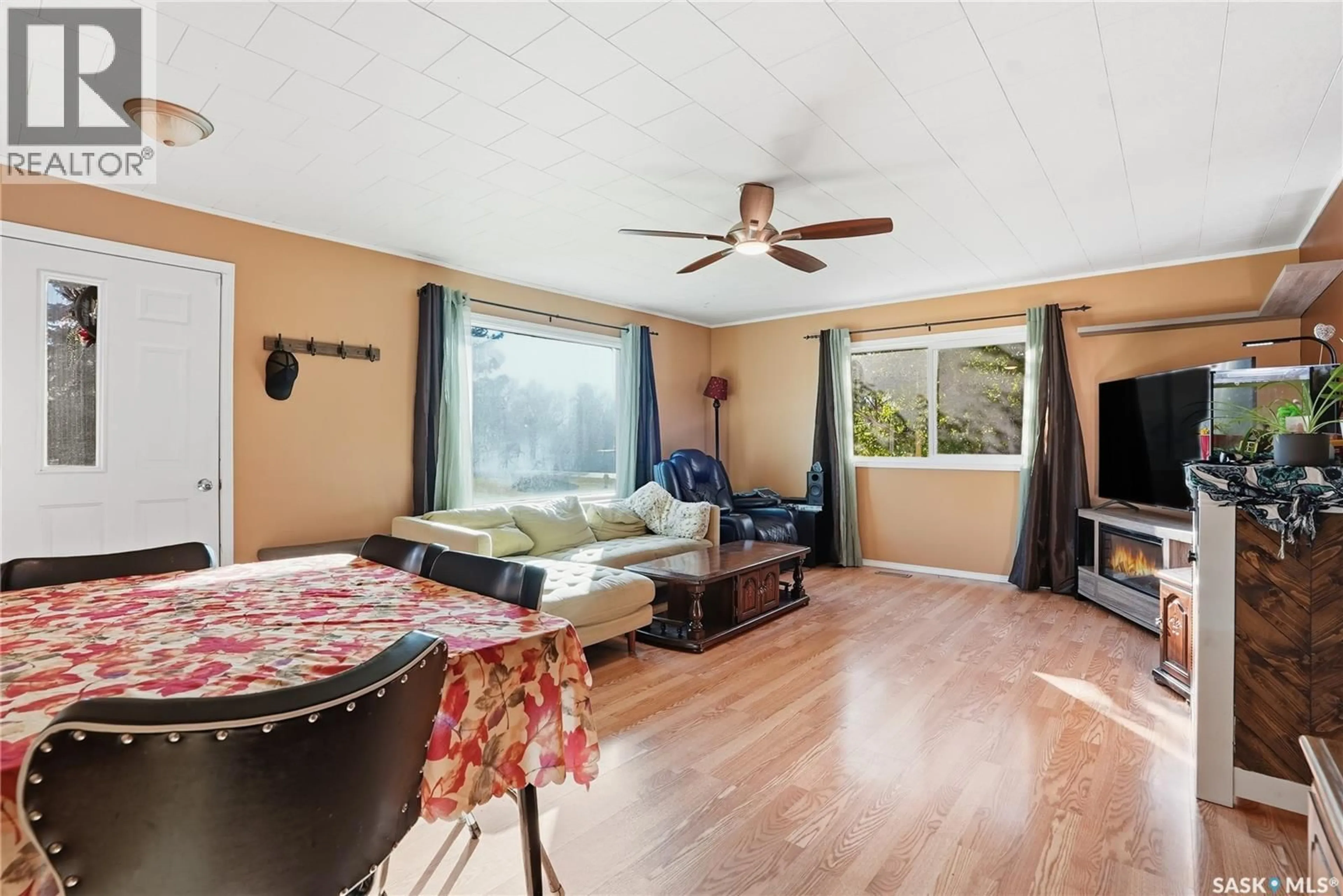 Living room with furniture, wood/laminate floor for 620 MILES STREET, Asquith Saskatchewan S0K0J0