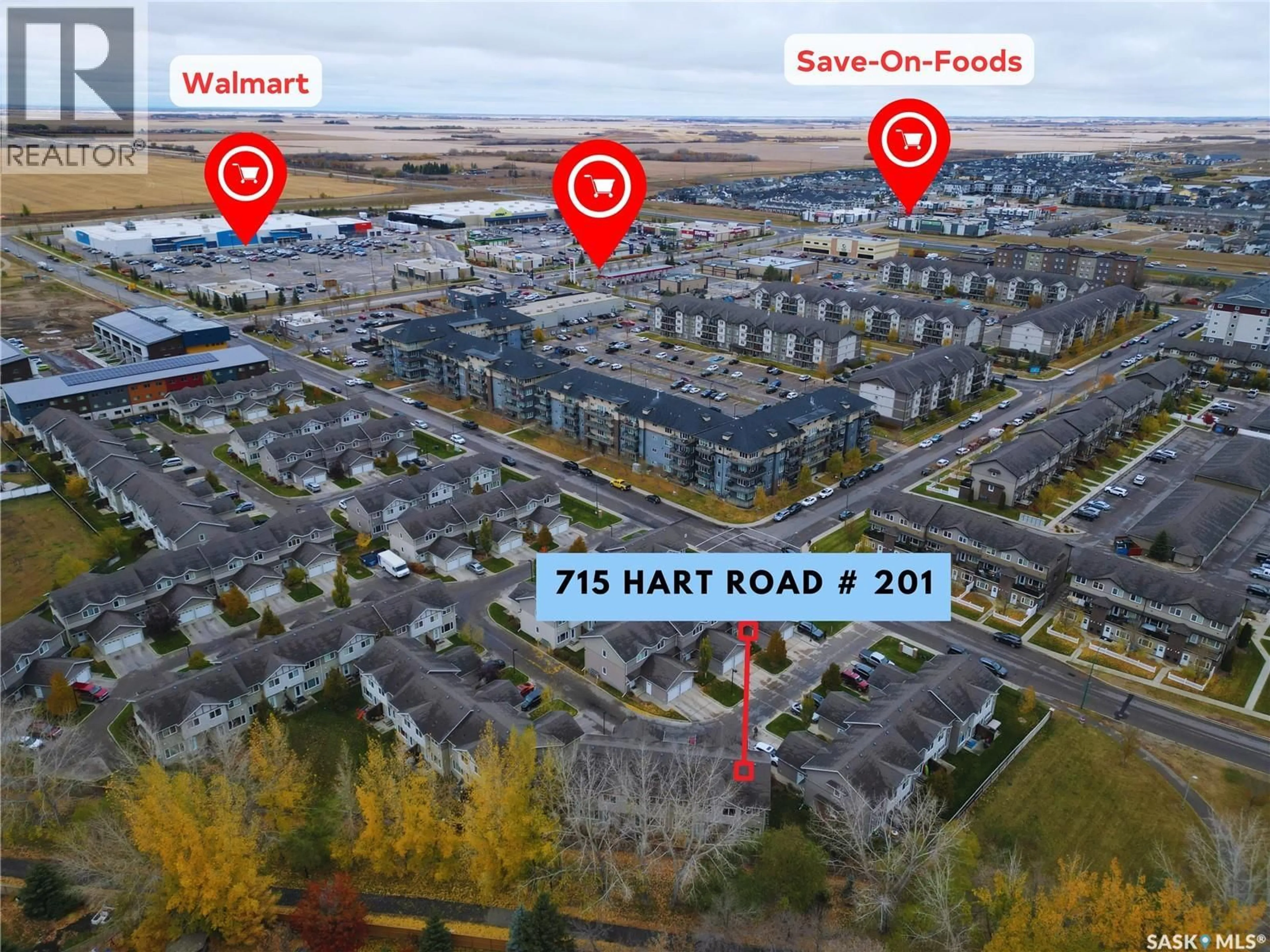 A pic from outside/outdoor area/front of a property/back of a property/a pic from drone, street for 201 715 HART ROAD, Saskatoon Saskatchewan S7M3Y7