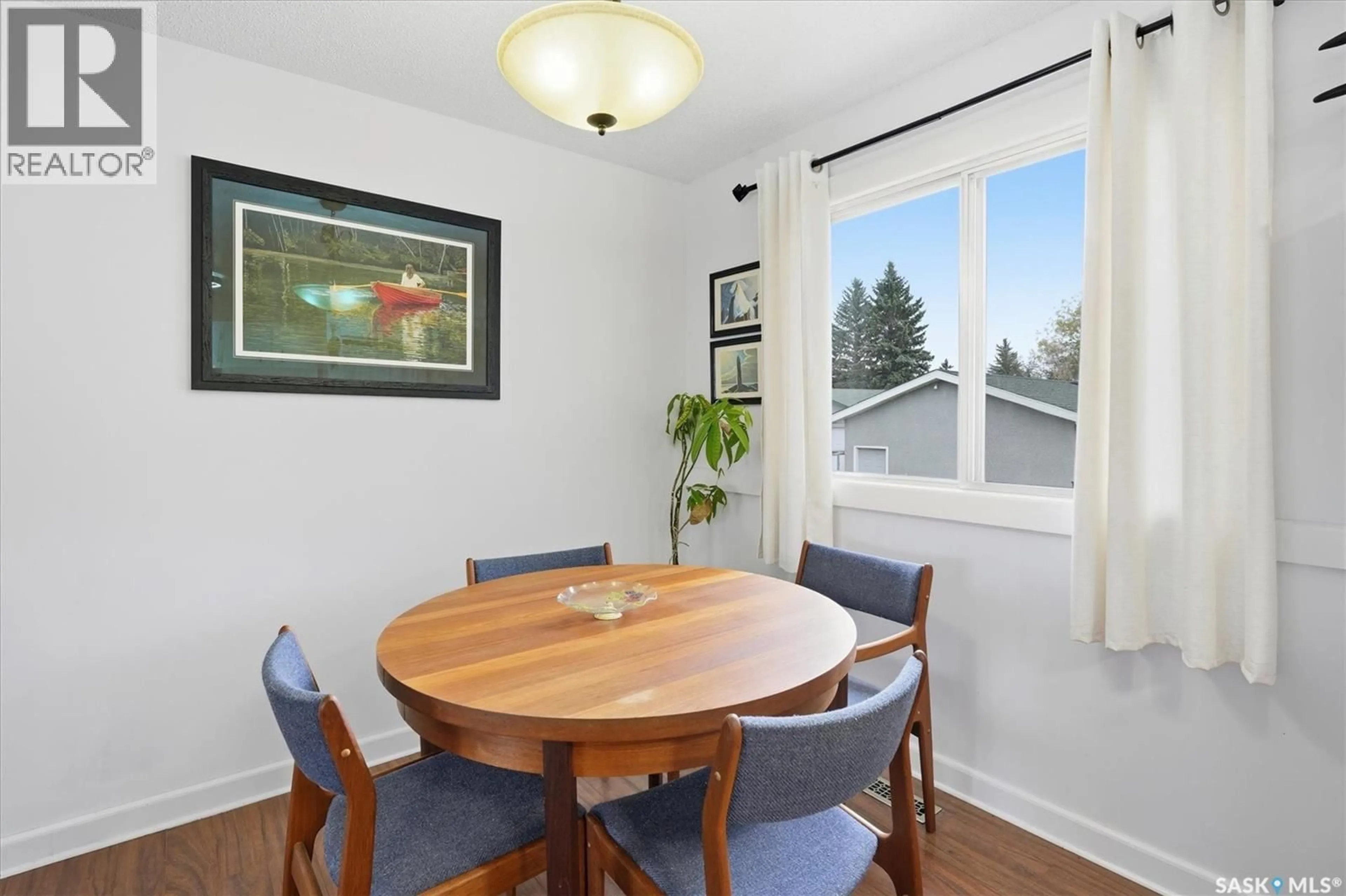 Dining room, wood/laminate floor for 206 WESTERN CRESCENT, Saskatoon Saskatchewan S7H4J6