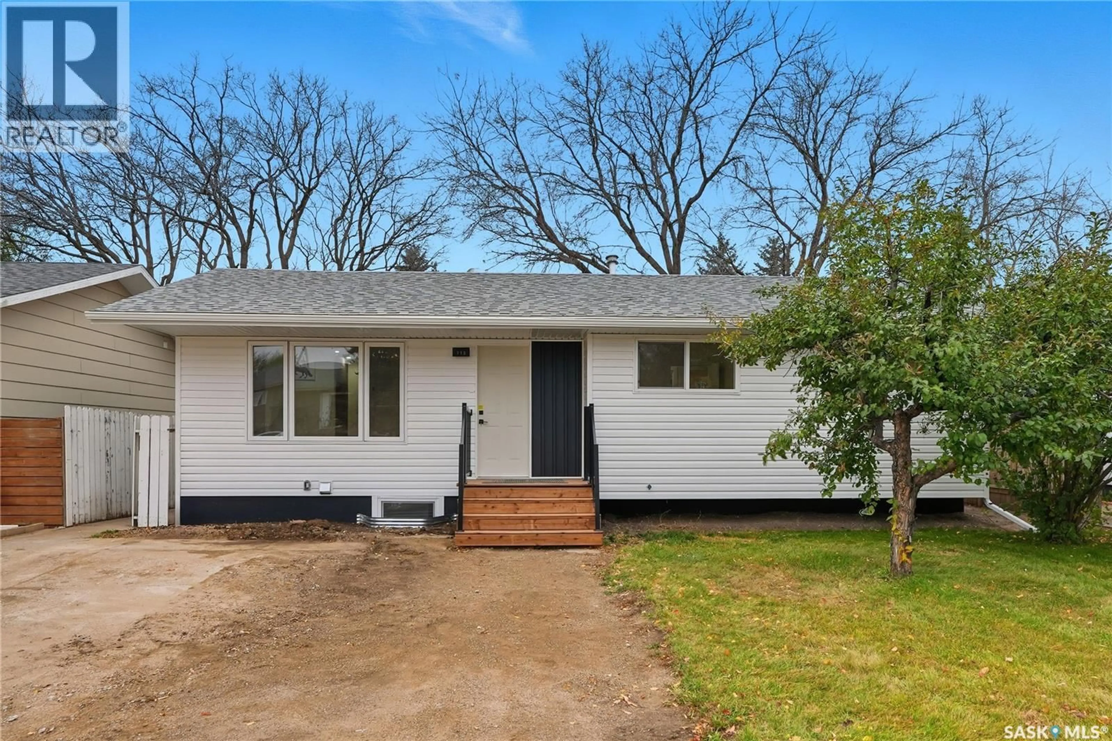Home with vinyl exterior material, street for 113 5TH AVENUE, Warman Saskatchewan S0K4S0