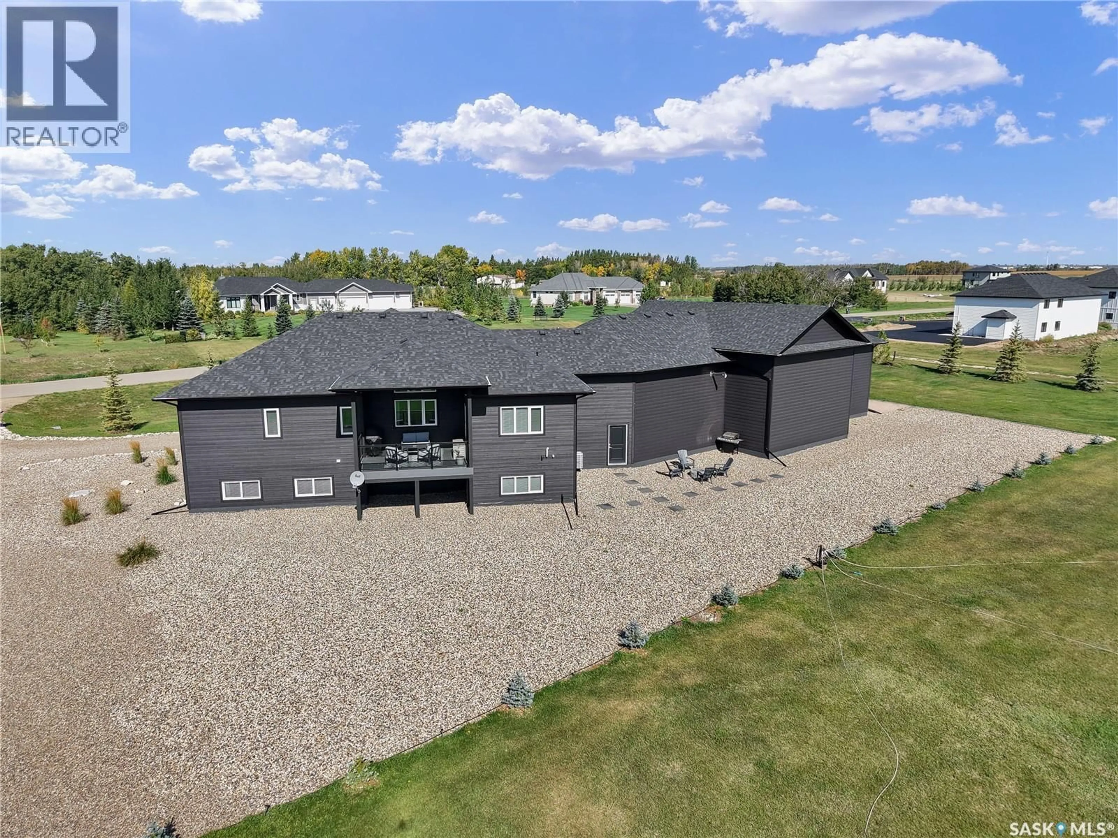 A pic from outside/outdoor area/front of a property/back of a property/a pic from drone, building for 76 GRANDVIEW TRAIL, Corman Park Rm No. 344 Saskatchewan S7T0W5