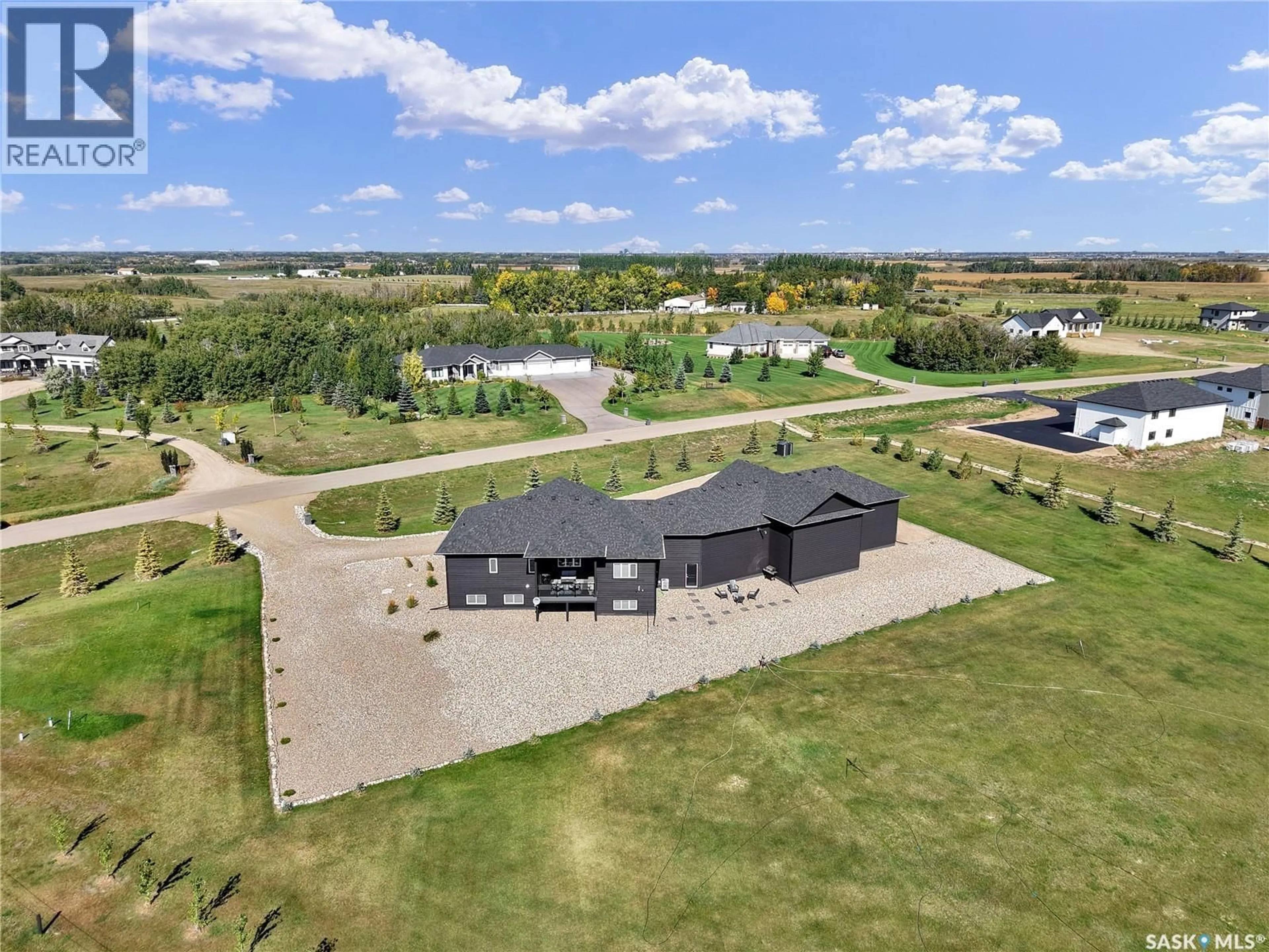 A pic from outside/outdoor area/front of a property/back of a property/a pic from drone, unknown for 76 GRANDVIEW TRAIL, Corman Park Rm No. 344 Saskatchewan S7T0W5