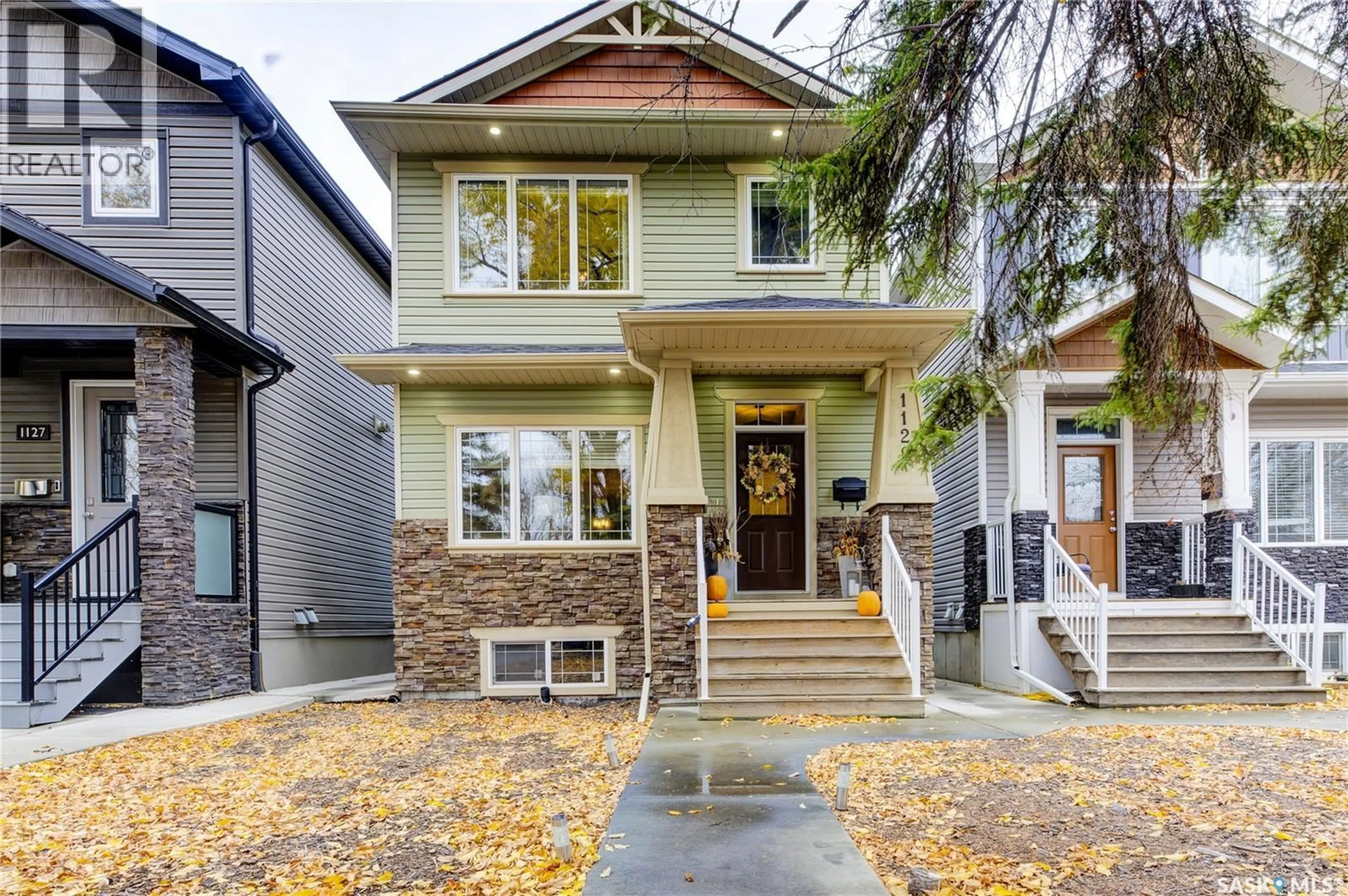 Home with brick exterior material, street for 1129 7TH STREET, Saskatoon Saskatchewan S7H0Y9