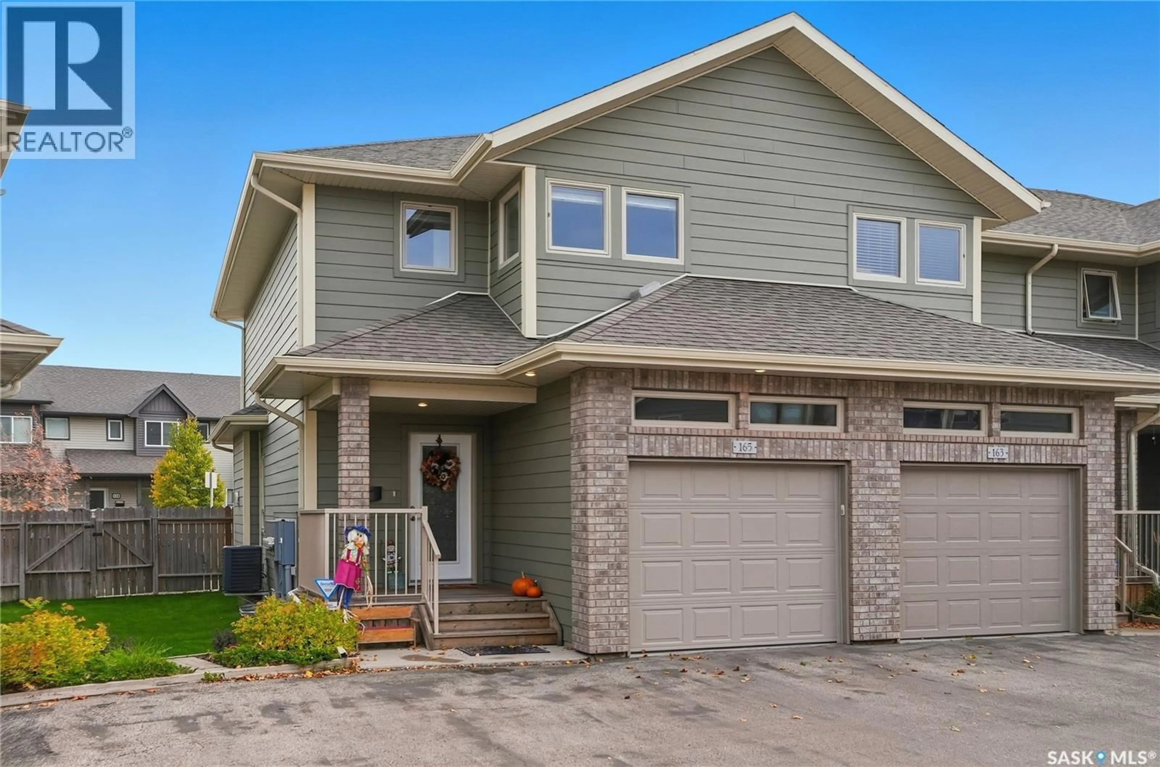 Home with vinyl exterior material, street for 165 115 SHEPHERD CRESCENT, Saskatoon Saskatchewan S7W0P8