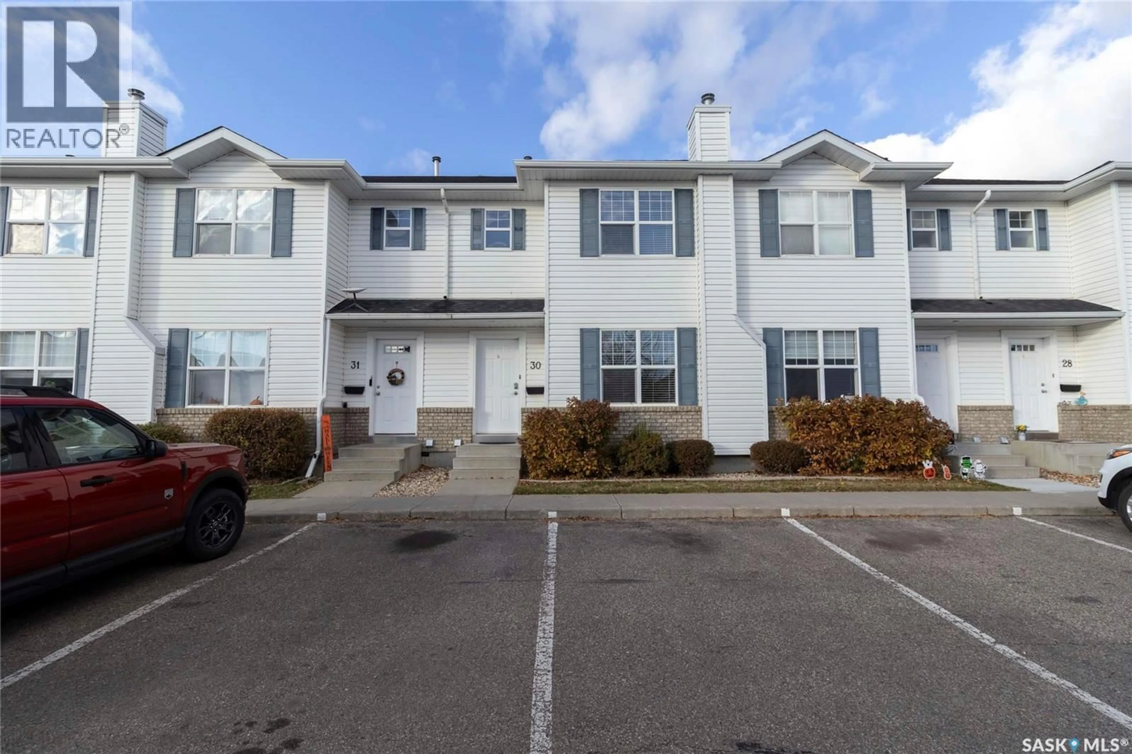 A pic from outside/outdoor area/front of a property/back of a property/a pic from drone, unknown for 30 203 HEROLD TERRACE, Saskatoon Saskatchewan S7V1H3