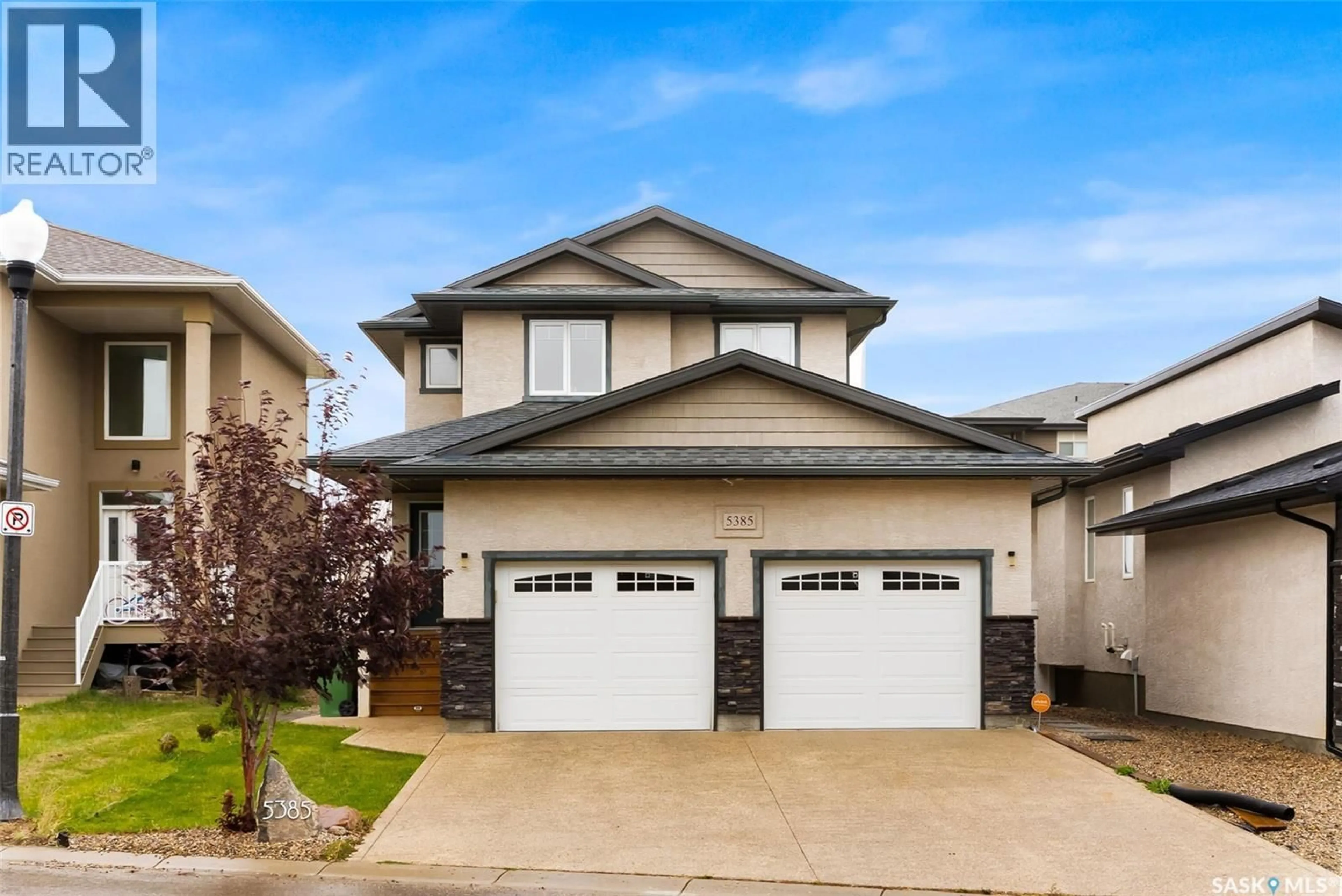 Home with vinyl exterior material, street for 5385 MCKENNA CRESCENT, Regina Saskatchewan S4W0G2