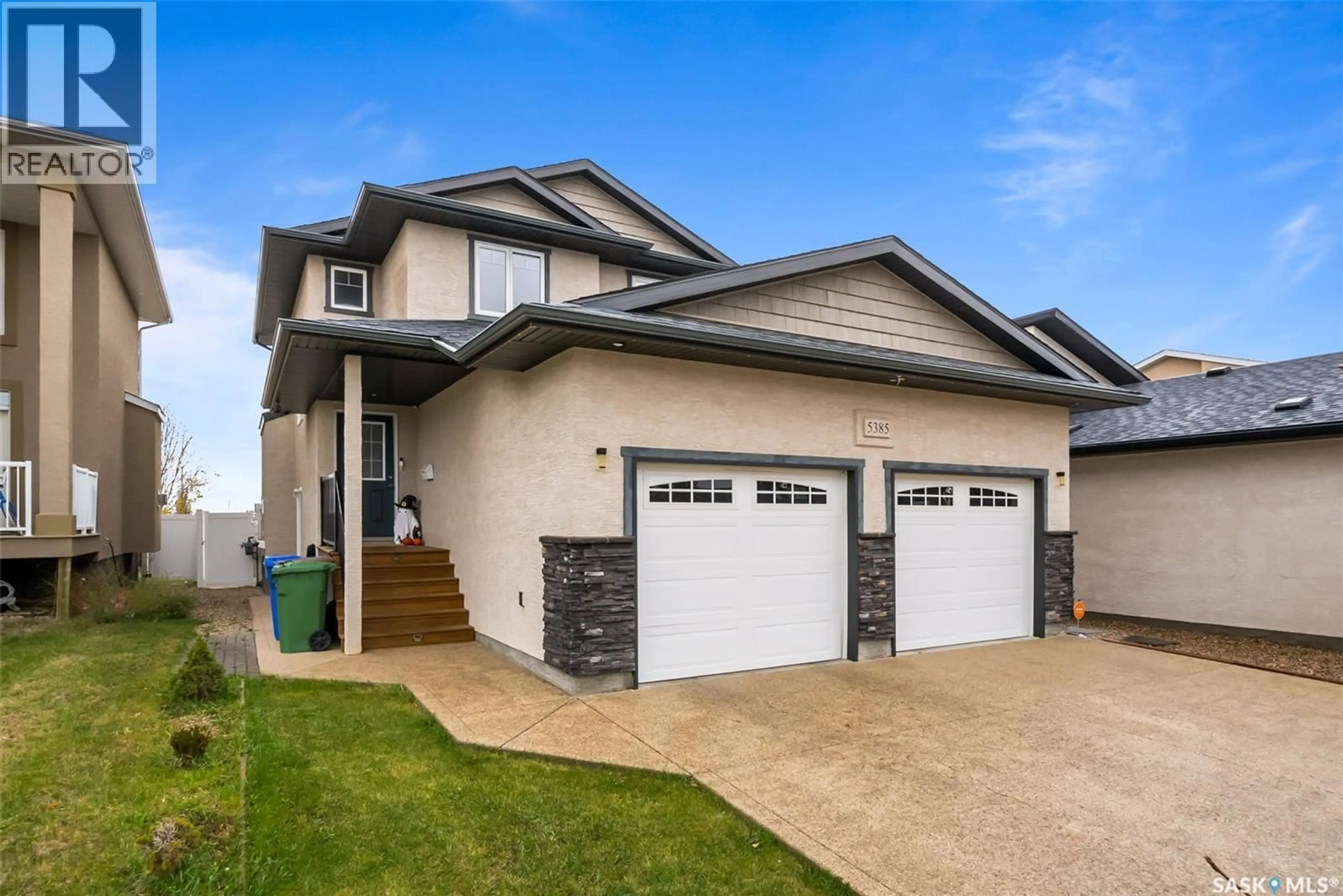 Home with vinyl exterior material, street for 5385 MCKENNA CRESCENT, Regina Saskatchewan S4W0G2