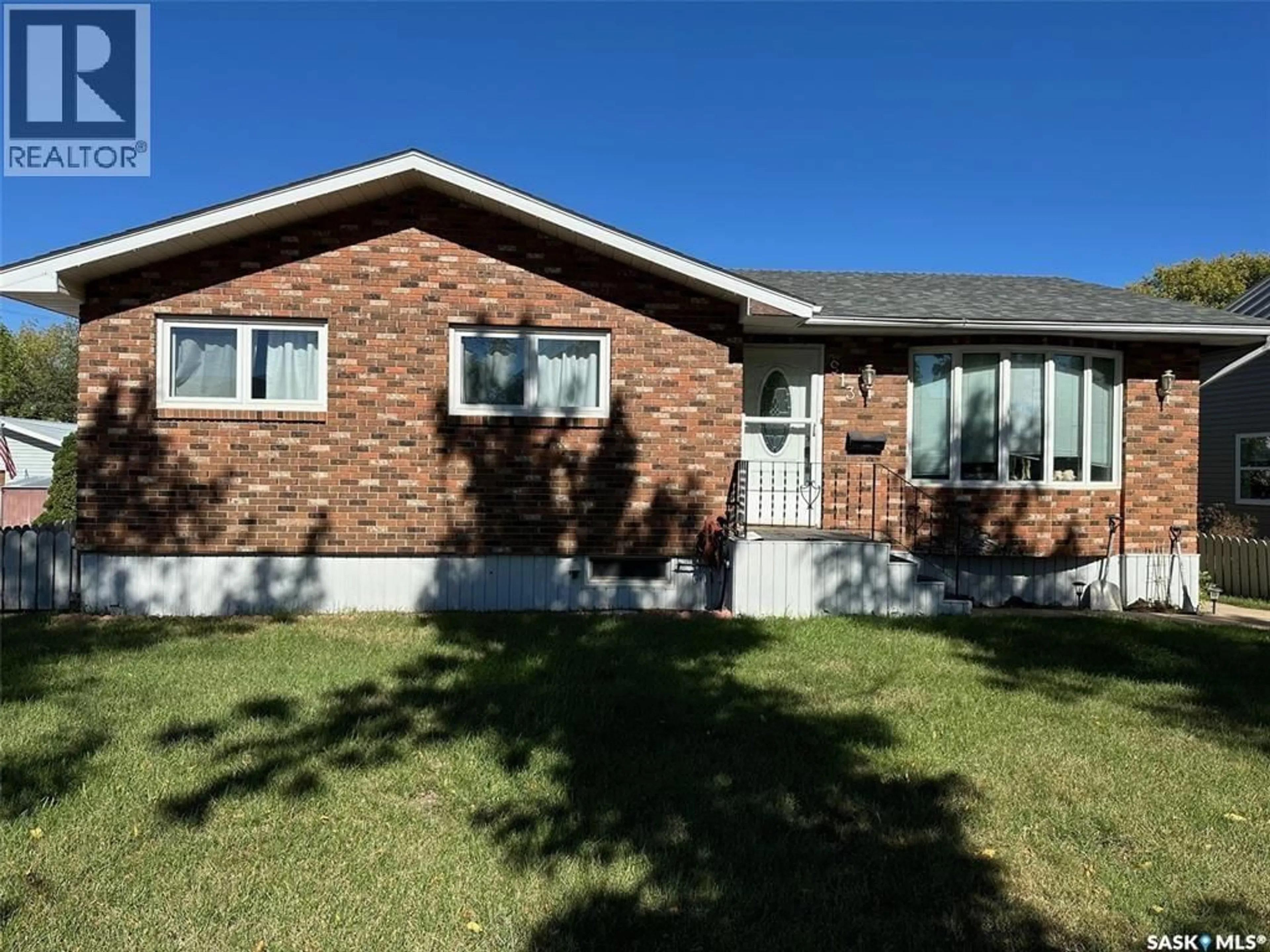 Home with brick exterior material, street for 913 THIRD STREET, Estevan Saskatchewan S4A0R2