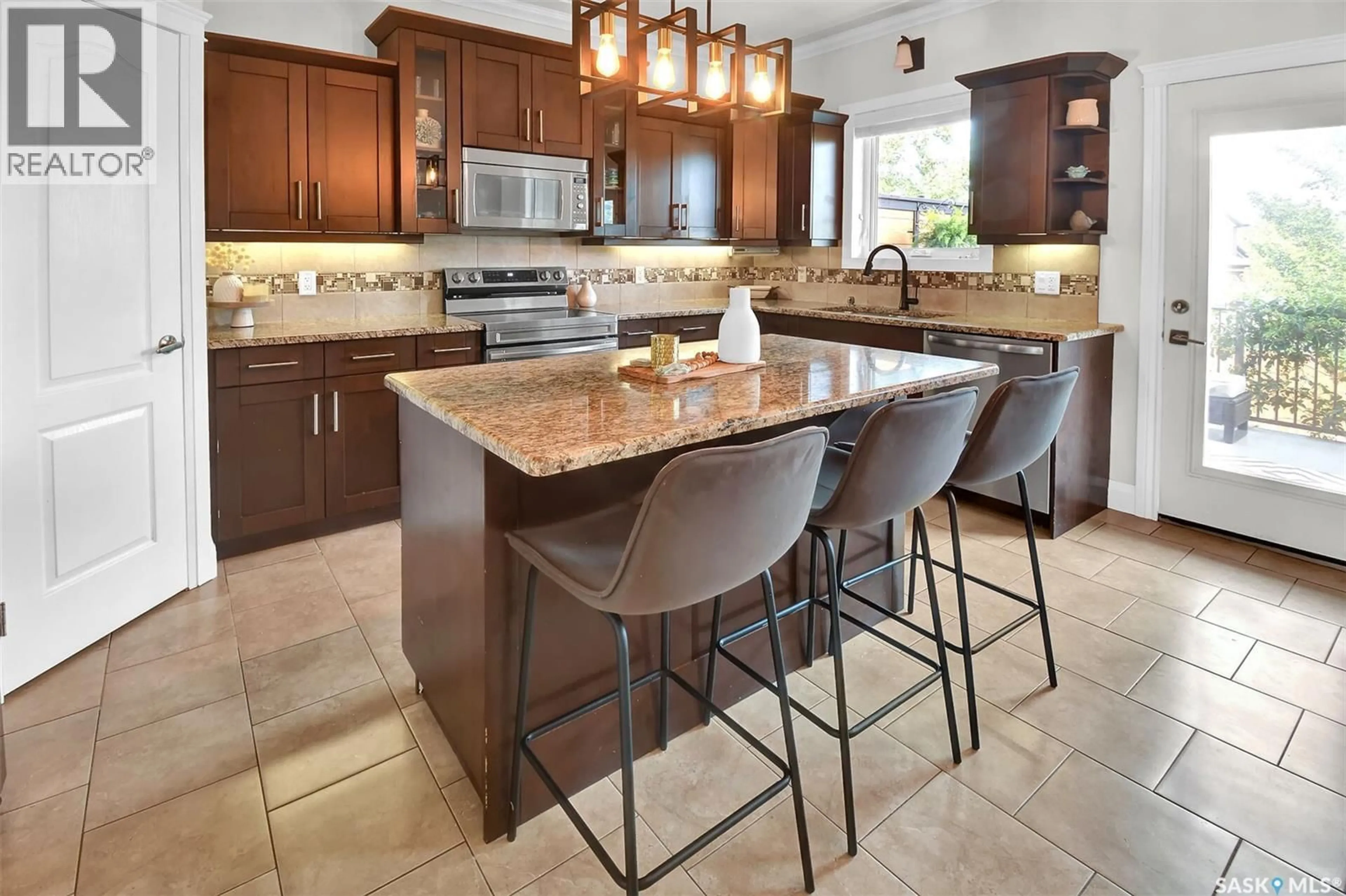 Open concept kitchen, ceramic/tile floor for 1942 POHORECKY TERRACE, Saskatoon Saskatchewan S7W0S1