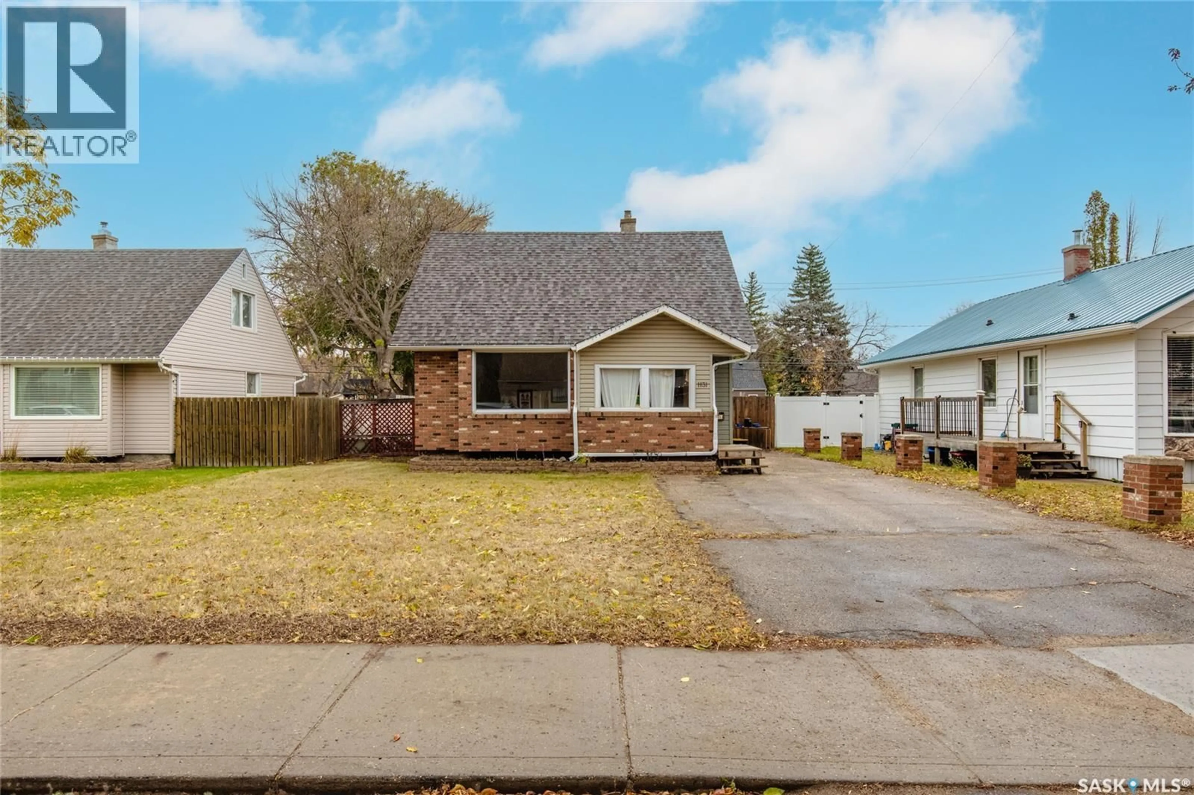 A pic from outside/outdoor area/front of a property/back of a property/a pic from drone, street for 1131 7TH AVENUE, Moose Jaw Saskatchewan S6H4C6