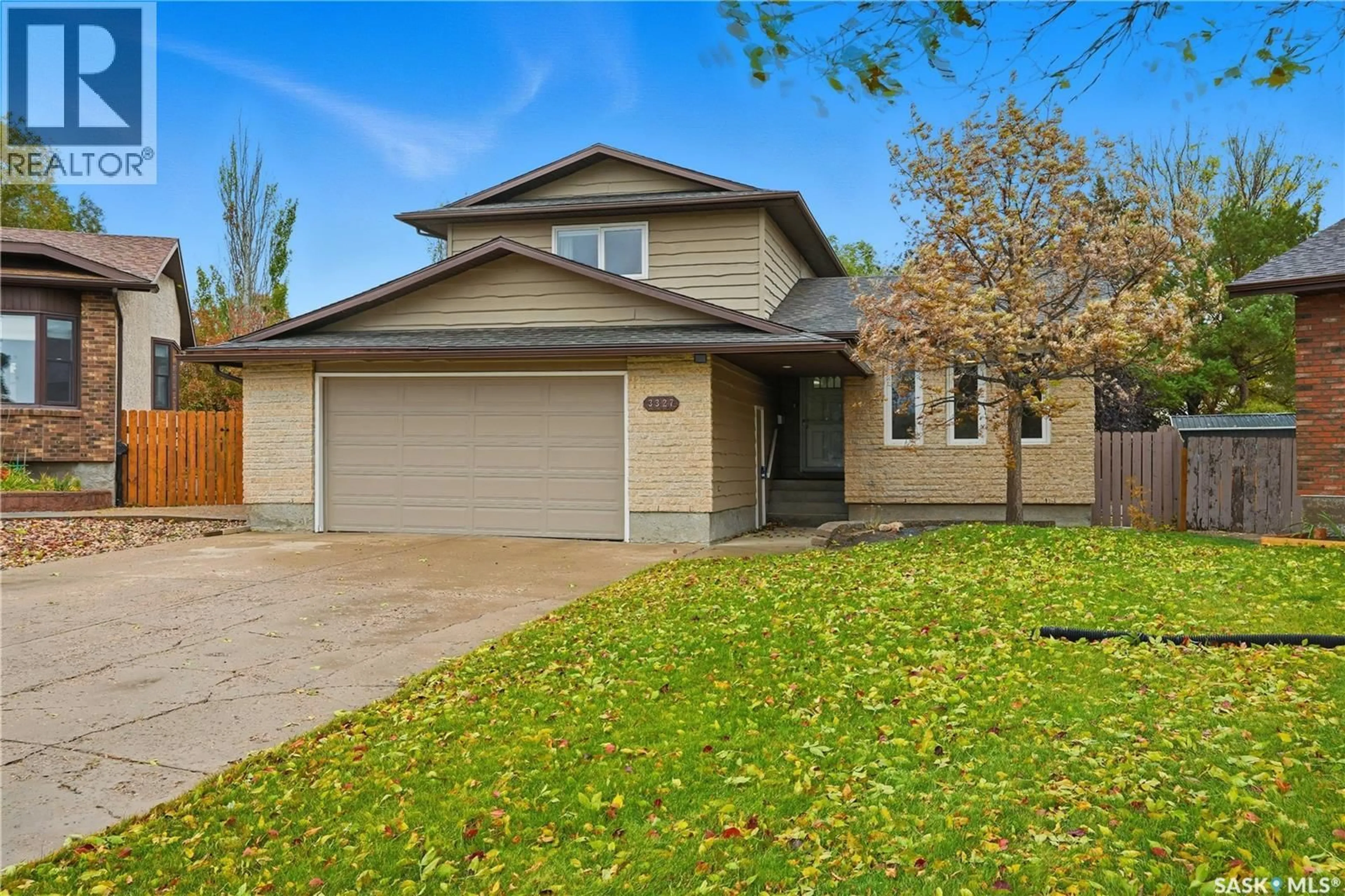 Home with vinyl exterior material, street for E - 3327 COUGHLIN BAY, Regina Saskatchewan S4V1W3