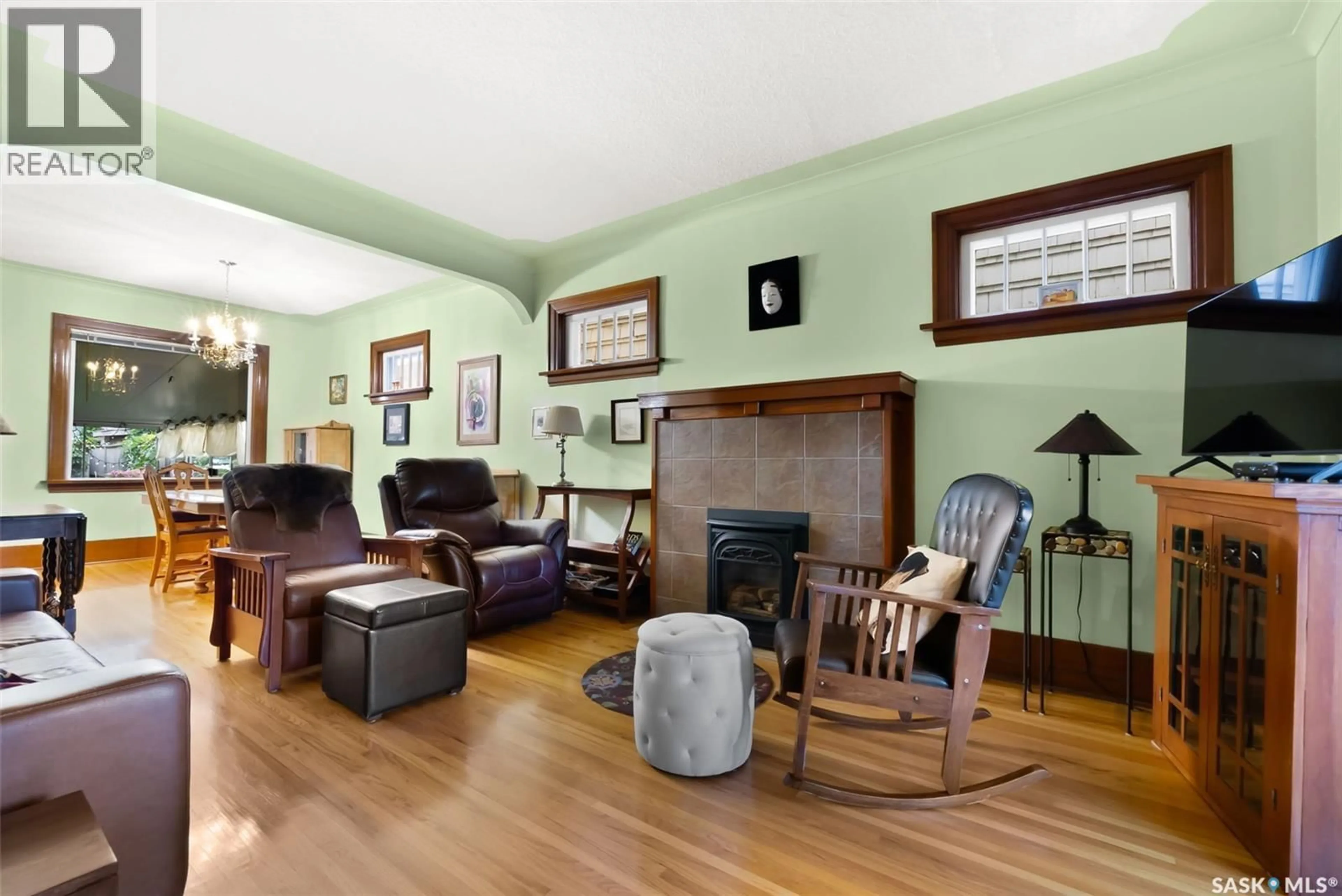 Living room with furniture, wood/laminate floor for 2321 ST JOHN STREET, Regina Saskatchewan S4P1S7