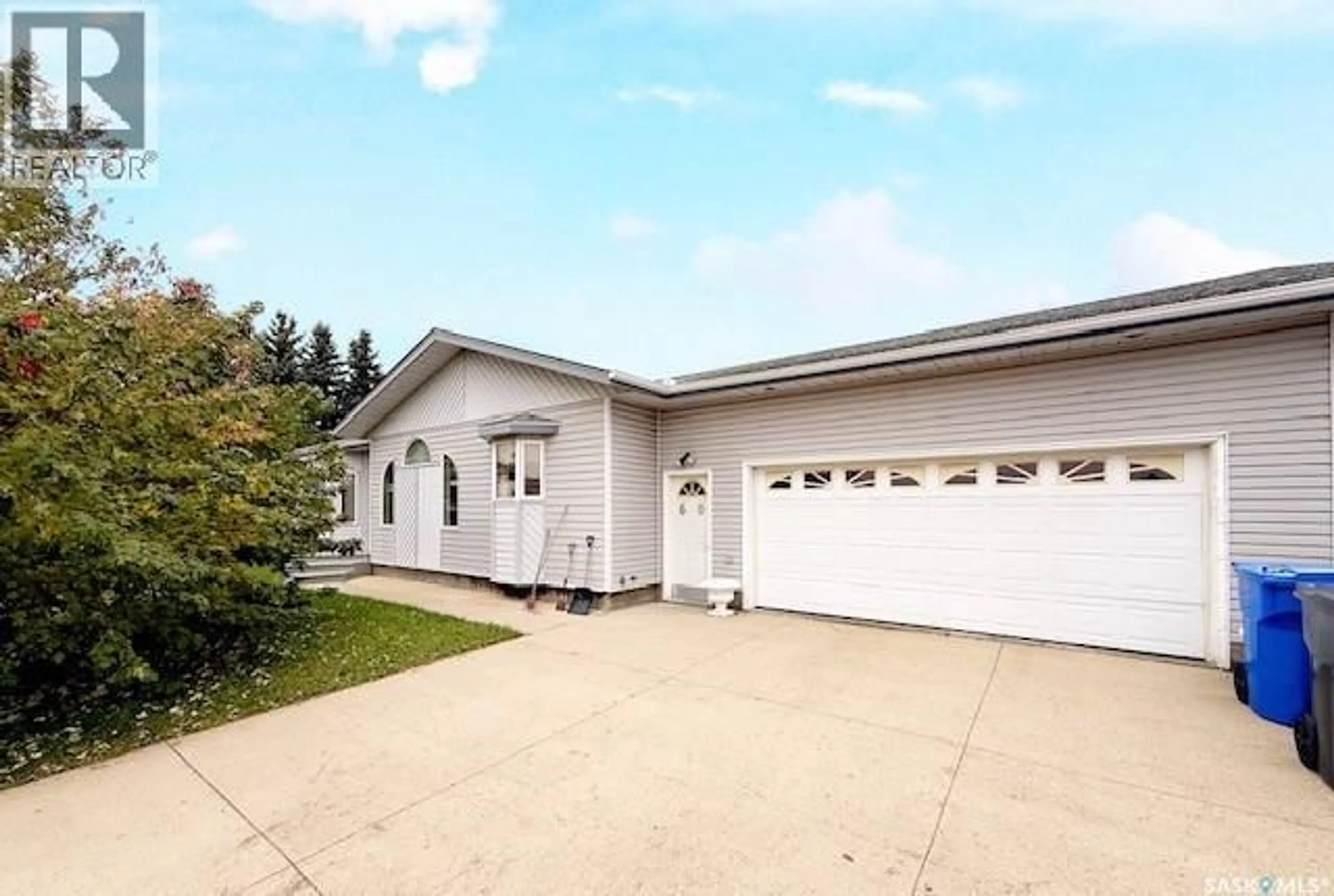 Home with vinyl exterior material, street for 60 BANKS CRESCENT, Kamsack Saskatchewan S0A1S0